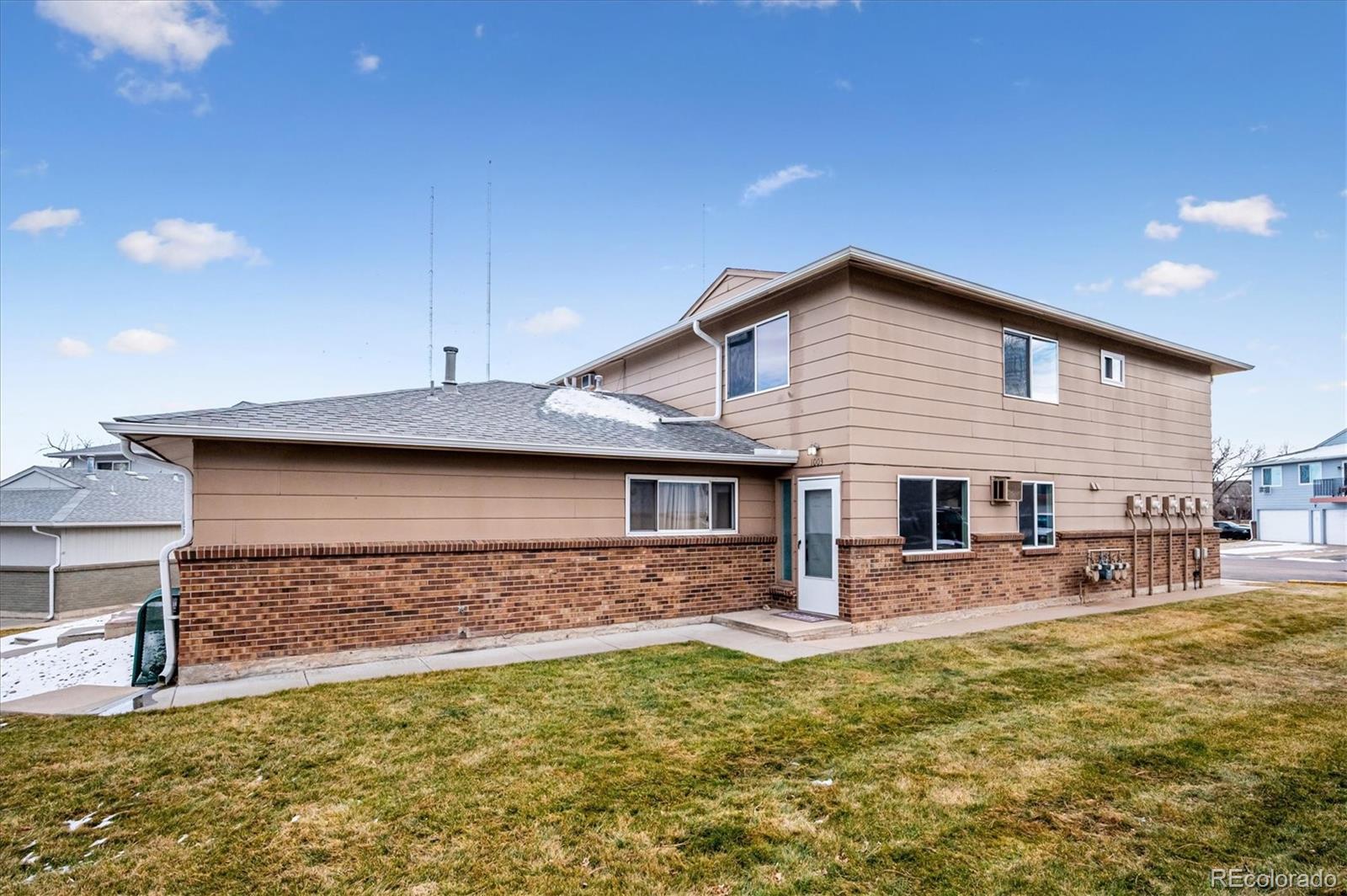 Experience modern living in this fully renovated two-bedroom townhome with pool and mountain views! Every surface has been updated with new finishes from top to bottom. Brand-new flooring flows throughout the entire residence. The efficient galley kitchen showcases freshly installed cabinetry paired with stylish countertops. The new appliances and laundry wash tower are included! An open-concept main floor unites the kitchen, dining, and living areas—ideal for both daily routines and hosting guests. Generous natural light fills the space through large windows. Upstairs, you'll find two inviting bedrooms, including a primary bedroom with a walk-in closet. The second bedroom provides flexibility—use it as a guest room, home office, or creative space. The newly renovated bathroom rounds out the upper floor. At 922 square feet across two levels, this home maximizes every inch. Convenient features include a shared one-car garage with extra storage capacity and a new boiler system installed last year, a $15,000 investment ensuring reliable heating throughout all seasons. Hampden Villas offers community amenities including a pool, landscaped common areas, and children's play structures within well-kept grounds. The setting provides excellent access: convenient highway connections through Hampden and 6th Avenue, nearby Belmar's diverse shopping and dining scene, and immediate entry to Bear Creek Greenbelt's pathway network. Restaurants, parks, and public transportation are all within walking distance. This completely refreshed townhome presents an attractive package of contemporary updates, desirable location, and reasonable HOA fees—a standout value in today's market.