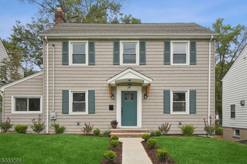 Located in the highly-sought after St. Cloud neighborhood and completely RENOVATED in 2025, this Colonial blends high-end updates with classic charm, offering 3 bedrooms, 2.5 baths and a two-car garage. The warm and welcoming main level features a family room with a fireplace and custom built-ins, a living room room, and a versatile office or den. The gourmet kitchen is the heart of the home with custom Cubitac wood cabinetry, center island with seating for three, quartz countertops, and Frigidaire Professional stainless steel appliances, flowing seamlessly into the dining area and out to a private patio overlooking the spacious and tree-lined backyard. Upstairs, the newly added primary suite impresses with both a walk-in closet and secondary closet, plus a spa-like bath with double vanity and oversized stall shower. Two additional bedrooms with wide closets share a fully renovated hall bath. A finished attic provides flexible space for a playroom, office, or flex room, while walkout lower level offers a recreation room with LVT flooring, laundry room, and convenient access to the garage & yard. Additional highlights include ALL NEW: kitchen & baths, primary suite, 2-zone HVAC, H/W/H, electric & plumbing, refinished HWD floors, new driveway & much more! Conveniently located just one block from top-rated elementary school and minutes from South Mountain Reservation, shops & restaurants, major highways & NYC transportation, this turn-key home is designed for today's lifestyle.