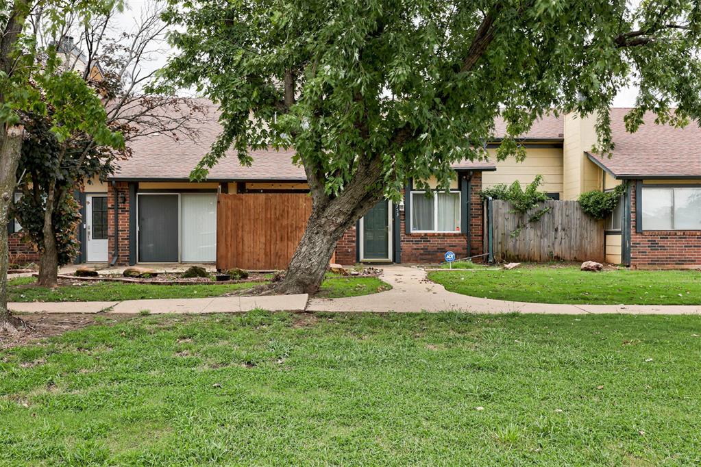 Move-In Ready Townhome in Rock Knoll Village! 2-story, 3 bed, 1.5 bath with 2-car garage. Updated kitchen with appliances, dining area opens to enclosed patio. Living room offers vaulted ceilings, LVT flooring & gas log fireplace. Renovated baths with modern tile & fixtures. Spacious primary suite with balcony access. HOA covers exterior maintenance, roof, insurance, pool & grounds. Convenient NW OKC location near Lake Hefner & shopping!