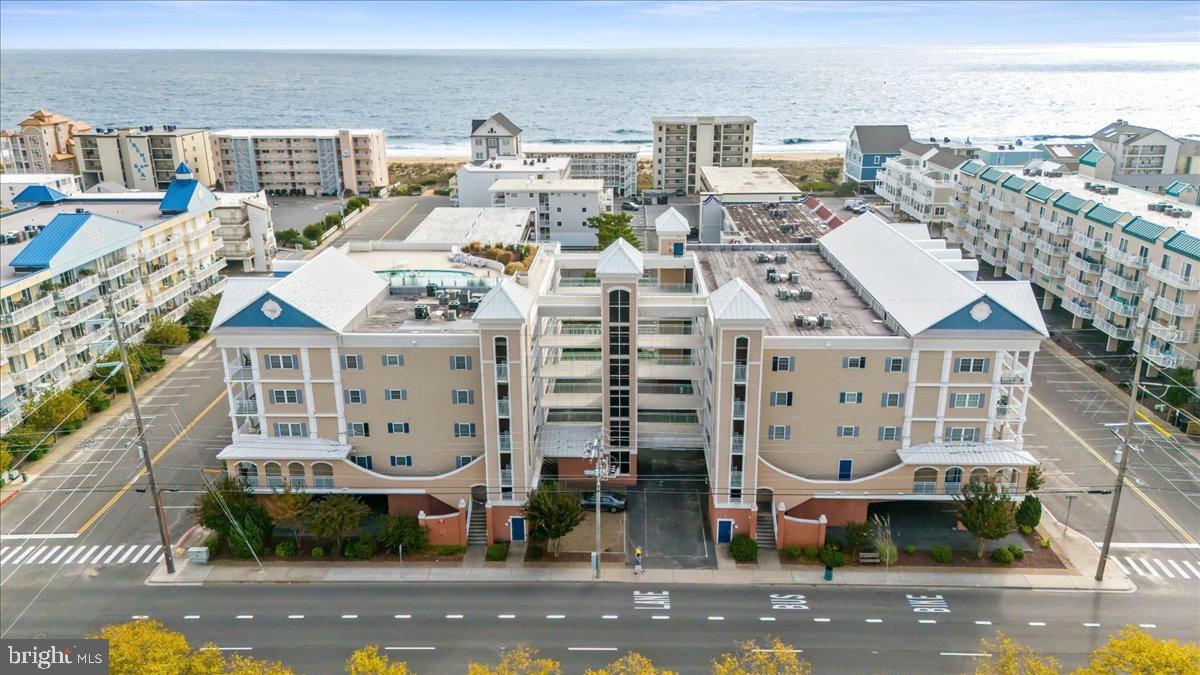 Seaside Retreat.. North Ocean City Condo!!! 3 bedroom and 3 bathroom... It comes fully furnished and equipped. The living space is open, with high ceilings and a large balcony where you can see the ocean. The primary bedroom has a walk-in closet and a nice en-suite bathroom. You'll find a spacious kitchen and a dedicated laundry room right inside the unit. The building itself has great amenities. There's a rooftop pool with incredible views, a handy exercise room, and a secure lobby. You also get a private storage locker for your beach gear, covered parking, and a convenient outside shower to rinse off after a day on the sand. This unit at Seaside Retreat on 137th Street is just a short distance from the beach and has everything you need for a comfortable stay, whether you're here for a week or all year. The Perfect spot to enjoy all the restaurants, shops, and fun that North Ocean City has to offer. It's a solid, well-equipped place for a beach getaway or for BeachLife Living!