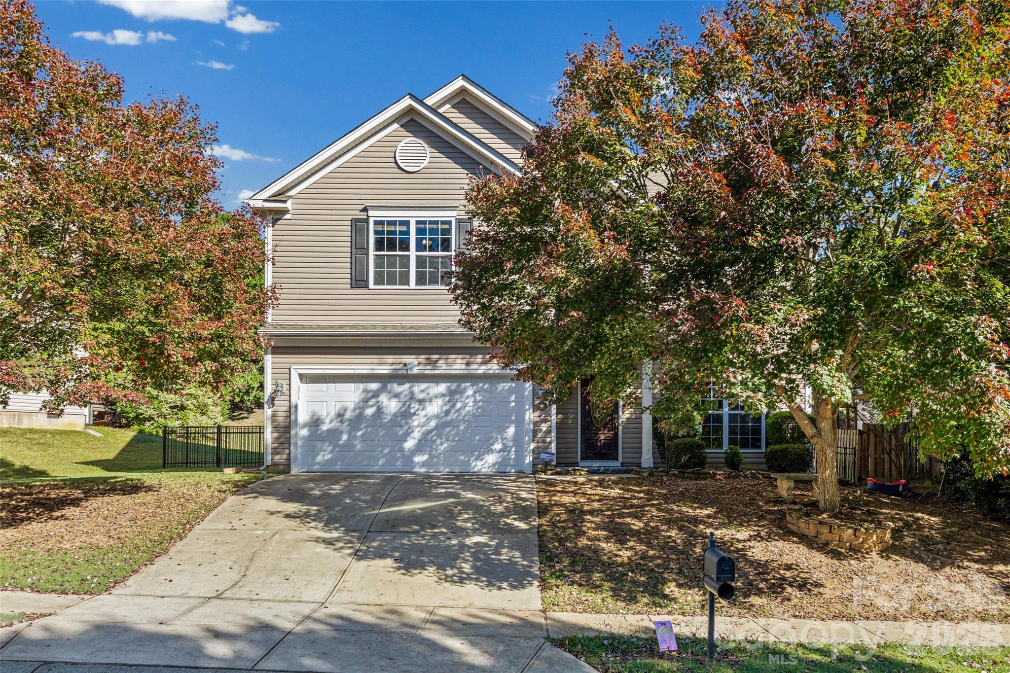 Thoughtful updates and a beautifully landscaped backyard make this home a must-see! The open-concept floorplan features a gorgeous kitchen with granite countertops, stainless steel appliances, gas range and center island that flows seamlessly into the main living areas. A dedicated main-level office offers a convenient work-from-home space. Upstairs, a spacious loft provides additional room to relax, work or play, along with three bedrooms and two full bathrooms. All bedrooms feature walk-in closets, and the spacious primary suite offers a gorgeous remodeled bathroom with stunning herringbone tile shower and a freestanding tub. Outside, enjoy the large, landscaped backyard and a gas line for your grill, making outdoor entertaining easy. Located in Clairmont in Indian Land, this home is centrally located in Indian Land between Fort Mill and Ballantyne and just minutes from shopping, dining, and Harrisburg Park. Schedule a showing today!