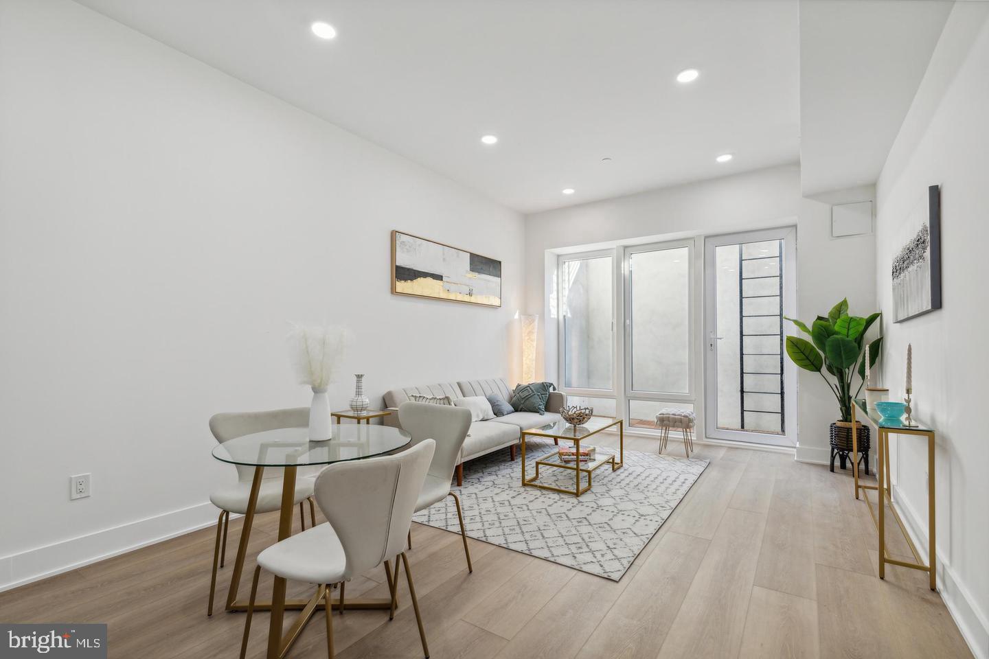 LOW CONDO FEES! Welcome to 705 Quincy St NE #2F – a beautifully designed residence nestled in a newly built boutique building, perfectly situated to experience the best of DC living. This meticulously crafted home is a showcase of premium finishes, featuring wide-plank engineered hardwood floors, elegant custom lighting, and oversized windows that fill the space with natural light and offer delightful views of the neighborhood.Step inside to discover an expansive, open-concept layout that's perfect for both everyday living and entertaining. The living and dining areas flow effortlessly into a modern chef's kitchen, complete with quartz waterfall countertops, sleek European cabinetry, and top-of-the-line stainless steel appliances.This home boasts two spacious bedrooms, each offering generous closet space, along with two stylishly appointed bathrooms featuring high-end fixtures and finishes. With the added bonus of being just moments away from trendy restaurants, boutique shops, parks, and easy access to public transportation, the location could not be more ideal.Seize the opportunity to own this stunning property in one of DC’s most dynamic and sought-after neighborhoods!