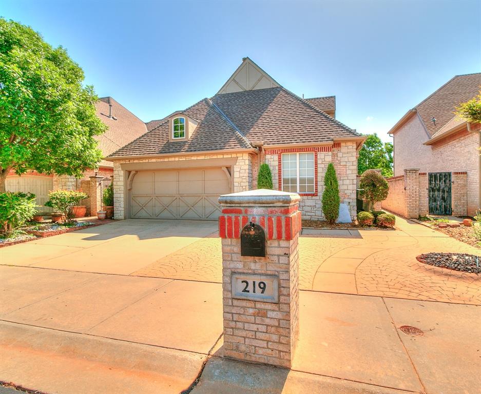 Welcome to this beautifully appointed two-story townhome in the private, gated community of Summit Lakes Villas. Combining security, elegance, and comfort, this home is a perfect sanctuary for those who value both style and tranquility.

Inside, you'll find three spacious bedrooms and two and a half bathrooms, including convenient Jack and Jill bathrooms for added privacy and functionality. Thoughtful design and abundant storage keep every space organized and clutter-free.

The open-concept kitchen is fully equipped with modern appliances—dishwasher, microwave, refrigerator—and a breakfast bar, making it ideal for entertaining or enjoying a quiet morning at home.
The inviting living area features beautiful wood flooring, soaring 10-foot ceilings, ceiling fans, and a cozy fireplace, setting the stage for relaxation and gatherings. The master suite offers a generous walk-in closet and a luxurious bathroom with a jetted tub, providing a spa-like retreat.

Step outside to the expansive open deck overlooking the lake, perfect for hosting get-togethers or unwinding with tranquil water views and gentle breezes.

Additional highlights include a modern security system, attached garage, and access to the community’s scenic walking trails and lakes. Located in the highly regarded Norman school district and just minutes from the University of Oklahoma and local amenities, this home offers both convenience and sophistication.
Experience the perfect blend of natural beauty, comfort, and upscale living. Don’t miss your chance to make this stunning lakeside townhome your new haven—book your private showing today!