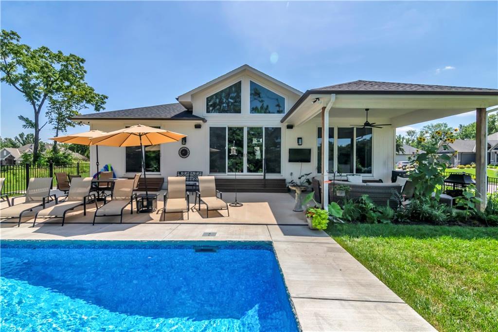 Welcome to 21 Bison Falls, an exceptional reverse 1.5-story home in the coveted new area of Lake Winnebago. Built just two years ago, this four-bedroom, three-and-a-half-bath residence offers resort-style living with a private pool, sun deck, and lush gardens surrounded by tall privacy trees. Beyond the fence, a serene nature trail awaits, and the home includes a guaranteed boat slip on the community’s multi-acre lake. This home also includes a slip at the community Marina next to the new neighborhood pool and amenities.

A highlight of this home is the custom live-edge wood front door—a $20,000 architectural statement that sets the tone for the property’s craftsmanship and uniqueness with a matching custom live-edge bench to enjoy the lovely front porch.

Step inside to discover an open-concept living room that flows seamlessly into a chef’s kitchen featuring premium Bosch appliances, a gas cooktop, wine chiller, and a spacious walk-in pantry. Natural granite countertops and organic stone details add warmth and elegance, while expansive windows fill the home with natural light. (Also spacious 3-car garage)

The primary suite is a true retreat, complete with an electric fireplace, a spa-like bath, walk-in shower, soaking tub, and a spacious walk-in closet that conveniently connects to the laundry room. Sliding glass doors open directly to the pool, creating a perfect indoor-outdoor sanctuary.


The fully finished lower level offers two additional bedrooms with a Jack-and-Jill bath, a separate guest half-bath, and plenty of space for entertainment—ideal for a pool table, ping-pong, or a home theater setup.

Lake Winnebago residents enjoy top-tier amenities including a community swimming pool, horse stables, a private marina with a restaurant, and access to one of the area’s most beautiful lakes.

This home offers privacy, luxury, and thoughtful design—ready for its next owner to move in and start enjoying the Lake Winnebago lifestyle.