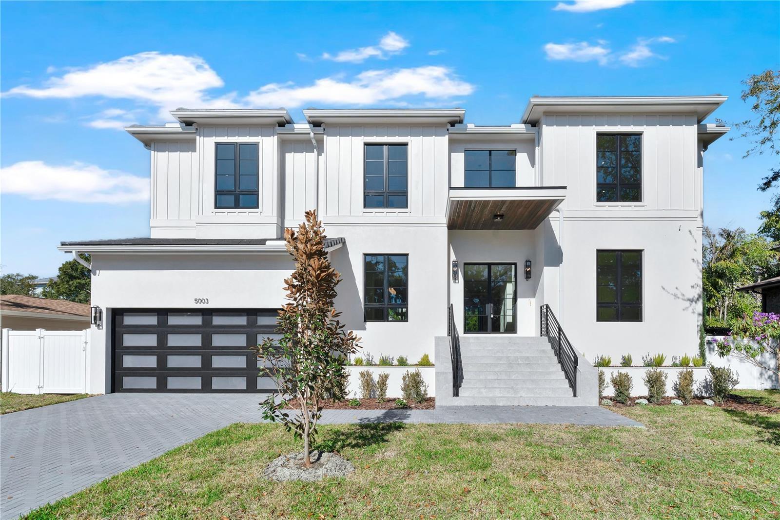 Modern Elegance Meets Thoughtful Design.  This stunning new construction home by Baywalk Custom Homes, is currently completed and offers a unique opportunity to own a residence where luxury and functionality converge. Nestled in the sought-after neighborhood of Sunset Park, the property is being meticulously crafted to provide a seamless blend of contemporary architecture and high-end finishes.  Boasting five spacious bedrooms and seven elegant bathrooms, this home features and open-concept layout perfect for entertaining and everyday living. The heart of the home--a gourmet kitchen--will be equipped with top-of-the-line appliances, custom cabinetry, and a grand center island.  Expansive windows will flood the interior with natural light, highlighting the premium flooring and sophisticated design elements. Whether you envision hosting gatherings in the generously sized living spaces, unwinding in the luxurious primary suite, or enjoying the landscaped outdoor pool area, this home promises to deliver an unparalleled living experience.  Don't miss the chance to make this dream home your own. Contact us today to learn more about the details and schedule a site visit!