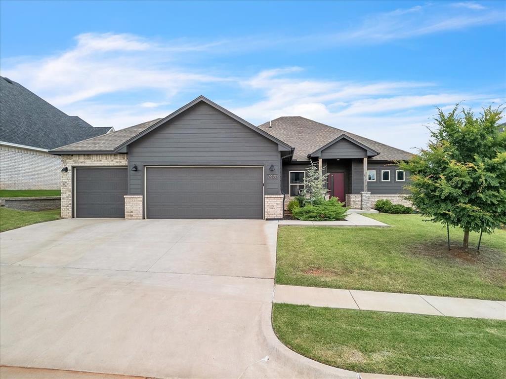 Stunning and move-in ready in Rockwell Park! This one-owner home built in 2020 features 3 bedrooms, 2 bathrooms, and a rare 3-car garage—all nestled in the award-winning Deer Creek School District. The welcoming exterior with stone accents and a covered entry leads into a light-filled, open-concept living area with soaring ceilings and a custom tile fireplace that makes a statement.

The kitchen offers painted cabinetry, granite countertops, stainless steel appliances, and a clean subway tile backsplash—perfect for both everyday living and entertaining. The spacious primary suite includes a large walk-in closet and ensuite bath with dual vanities and great storage. Two additional bedrooms are well-sized with ample closet space.

Step outside to a covered back patio and fully fenced yard ready for outdoor grilling, play, or pets. Other highlights include a dedicated laundry room, energy-efficient features, and a layout that lives large. Located just minutes from the Kilpatrick Turnpike, shopping, restaurants, and parks—this home checks all the boxes. Schedule your showing today!
