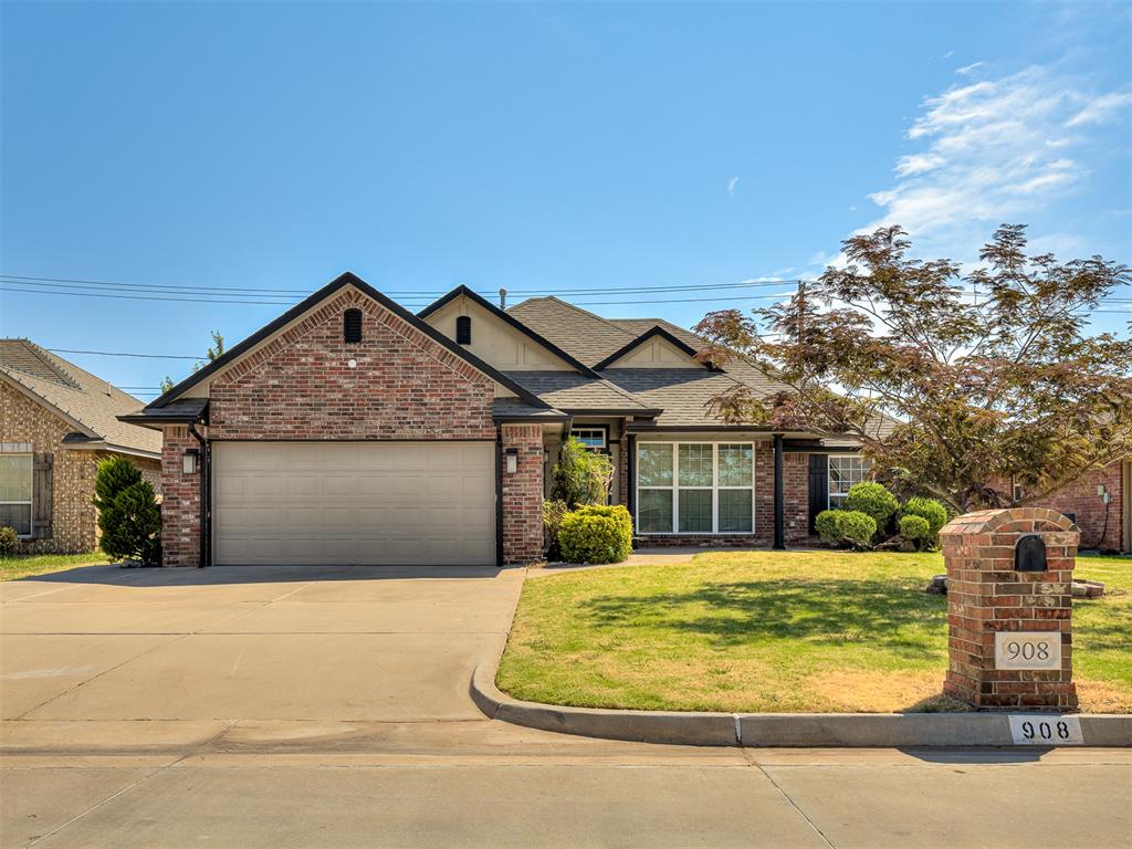 Welcome to 908 Ridgeway Dr! This inviting 3-bedroom, 2-bathroom home offers a spacious open-concept living, dining and kitchen layout with soaring vaulted ceilings and plenty of natural light. The kitchen features abundant cabinetry, granite countertops, tile backsplash, breakfast bar and an easy flow into the dining and living areas. Perfect for everyday living and entertaining.The split floor plan provides added privacy, with the primary suite thoughtfully separated from the secondary bedrooms. The spacious primary features vaulted ceilings, a walk-in closet and private bath with a jetted tub/shower combination. Two additional bedrooms offer flexibility for family, guests or a home office. A walk-in storm shelter/safe room in the two-car garage is another valuable Oklahoma feature.Outside, enjoy an oversized covered front porch and huge covered back patio, with fans and electrical outlet for a hot tub. The backyard also features two shops, providing excellent space for storage, hobbies or projects, with one equipped with electricity and A/C.Located in Moore Public Schools near parks, restaurants and shopping, with convenient access to I-35 and I-240. The location provides an easy commute to Tinker AFB, Downtown OKC, the University of Oklahoma and Will Rogers World Airport. With its open floor plan, private primary suite, storm shelter, versatile outdoor spaces and hard-to-find backyard shops, this home has so much to offer. Welcome Home!