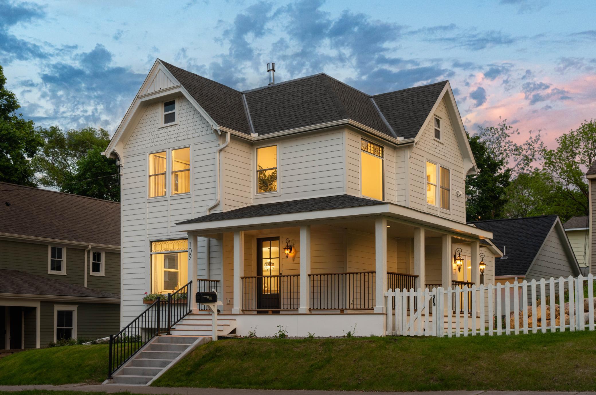 Perched atop the historic hills of Stillwater behind a charming white picket fence on a prominent corner lot, this extraordinary Victorian residence masterfully blends timeless old-world character with the comfort and sophistication of modern new construction. Thoughtfully reimagined from top to bottom, every space has been curated with intention while preserving the architectural integrity and charm.Rich in detail and warmth, the home showcases soaring ceilings, refined millwork, expansive windows, and inviting living spaces filled with natural light. The extensive renovation delivers a truly turnkey experience, offering the peace of mind and finish quality of new construction while maintaining the soul and craftsmanship of a bygone era.Positioned near the historic courthouse and steps from teddy bear park, enjoy immediate access to the city’s celebrated St. Croix River, boutiques, restaurants, coffee shops, parks and vibrant local culture. Convenient access to St. Croix Prep. Rarely does a home of this caliber offer the perfect balance of historic charm, modern luxury, and walkable lifestyle in one of Minnesota’s most picturesque communities.