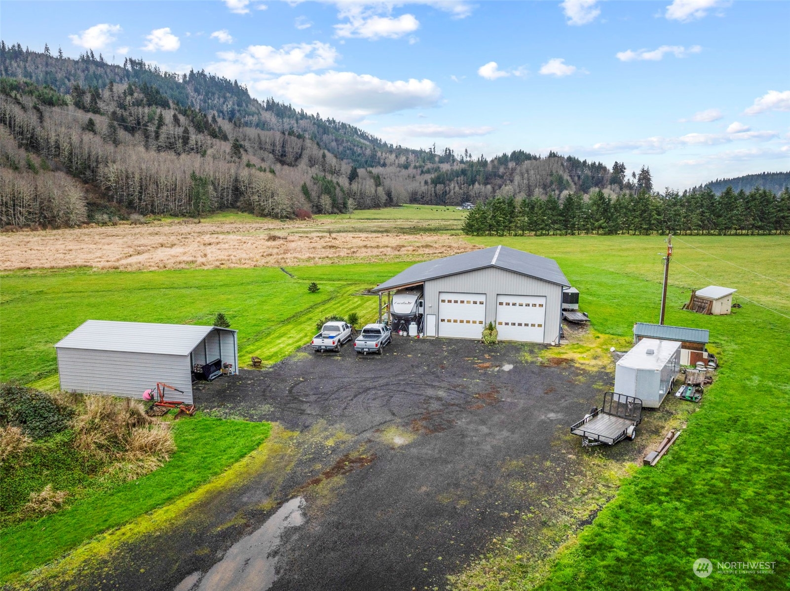 Welcome to the beautiful Skamokawa Valley! This unique property features a spacious 40x72 insulated shop with 12x20 incomplete but properly permitted loft, offering endless possibilities for storage, hobbies, or a home base for outdoor adventures. The large shop is equipped with power, water, washer/dryer hookups, 2-14' shop doors and so much more, making it ideal for workshop enthusiasts or storing recreational equipment. The property’s serene setting, surrounded by lush greenery, provides a peaceful escape, while its proximity to the Columbia River and local attractions ensures convenience and access to outdoor recreation. Whether you’re ready to build your dream home or occupy the shop, this property offers rare versatility and charm.