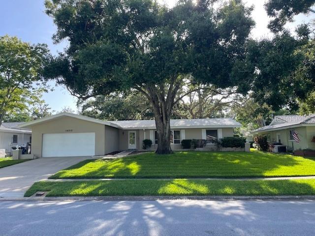 One Owner Home for 54 years.  Fantastic Dunedin Location.  Walk to Hammock Park.  House backs to Park Very Private. Wonderful mature Oak Trees, Tile roof.  Walk to Dunedin High School.   Golf cart area.  3 Bedrooms, 2 Bathrooms and a 2-car garage. Information from Pinellas County Property Appraisers.