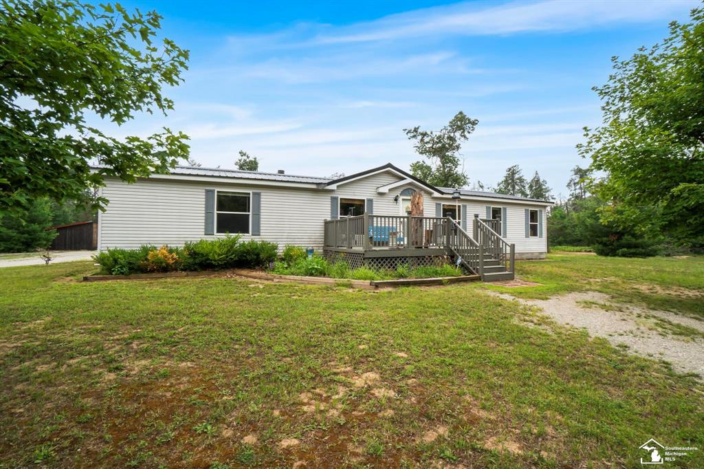 Beautiful home on a full basement, set on 10 peaceful acres in Hillman Township. This home offers a bright layout with a bonus room off the back, perfect for a family room, office, or hobby space. The full basement provides plenty of storage with potential to finish. Outside, enjoy two large outbuildings ideal for a workshop, storage, or recreational toys, plus plenty of space to roam, garden, or hunt. A rare find combining privacy, versatility, and room to grow. Schedule your showing today! Square footage and measurements estimated and deemed to be reliable but not exact BATVAI.