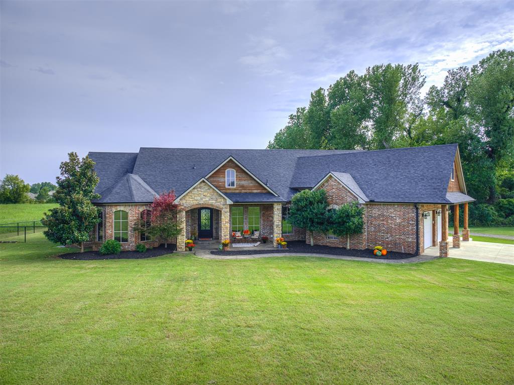 This is the one you have been waiting for! Imagine coming home to your own private 5-acre retreat, right in the heart of the city. From the moment you arrive at the gated entrance, the noise and the stress of the day begin fade away. This gorgeous home is full of spacious rooms, luxurious amenities, impeccable woodwork and enviable views from every room. In over 3,600 sq feet of living space you will find 4 bedrooms, 3 bathrooms, multiple living spaces, bonus rooms and a private office to fit your unique needs. The kitchen features a 6 burner Dacor stove, double ovens and flows seamlessly between the living spaces through the heart of the home. The primary suite is a true retreat with serene views, a spa-inspired stone shower, whirlpool tub with it's own fireplace, and ample space to rejuvenate body and soul. Upstairs, discover   a bonus room and bedroom with its own private entrance - ideal for multigenerational living, guests or a home business. Step outside to a spacious covered patio with wood burning fireplace, perfect for entertaining or enjoying nature year-round. Additional amenities include ~oversize 2 car garage with 8' doors to accommodate large vehicles ~70x40 fully insulated steel shop with 2 14' doors, conditioned office and covered RV parking ~2x6 walls with spray foam insulation throughout ~reinforced foundation ~dog wash in utility room ~central vac ~tankless water heater ~dedicated AV closet~ This home is more than a property - its a lifestyle. Schedule your private tour today to experience the perfect blend of privacy, luxury and convenience.