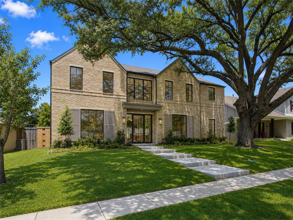 Incredible new construction by Olerio Homes in the highly sought-after Lakewood Elementary and just minutes from White Rock Lake. Situated on a quiet, tree-lined street, this transitional-style home offers exceptional craftsmanship and designer finishes throughout, including Visual Comfort lighting, wood clad windows, foam insulation, Level 4 smooth-finish walls, 8-foot solid-core interior doors, soft-close custom cabinetry, white oak hardwood floors, a marble fireplace with gas or wood-burning capabilities, a Wolf-Sub Zero appliance package, and expansive sliding glass doors that create seamless indoor-outdoor living. Enjoy the covered patio complete with an outdoor kitchen, retractable shade, and fireplace overlooking the spacious backyard.The thoughtfully designed 5,407-square-foot floor plan offers open-concept living with a dedicated study, game room, and a luxurious first-floor primary suite featuring a spa-inspired bath with a freestanding soaking tub and an spacious walk-in closet. Four additional en-suite bedrooms are located upstairs, providing privacy and flexibility for family and guests. The home also features two laundry rooms, one on each level, for added convenience.Conveniently located near White Rock Lake's scenic trails, parks, and recreation, as well as the shopping, dining, and neighborhood amenities of Hillside Village, this home offers an exceptional blend of luxury, quality, and an unbeatable location.