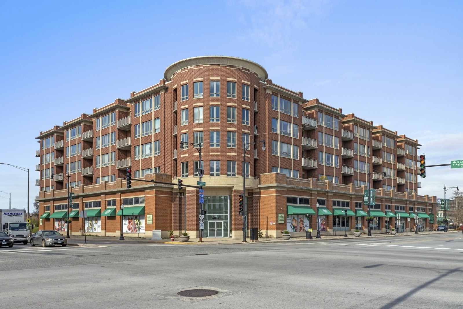 Amazing light-filled 2BR/2BA condo in the highly sought-after Sauganash Whole Foods building. This spacious west-facing unit features a desirable split floor plan design in a well-maintained elevator building. Enjoy newer Luxury Vinyl Wood flooring (2023)  in the living, dining, and kitchen areas, with fresh carpet (2023) in both bedrooms. The open-concept living and dining space flows seamlessly to a generous balcony-perfect for entertaining or relaxing while taking in stunning sunset views. The well-appointed kitchen offers granite countertops, custom tile backsplash, undermount sink, and eat-in island, along with a refrigerator, microwave, stainless steel oven/range and stainless steel dishwasher. The expansive primary suite includes a large walk-in closet plus two additional storage closets, and a private ensuite bathroom with a double vanity and walk-in shower. The second bedroom is also generously sized and features double closets. The second full bathroom includes a bathtub and shower combo. Additional highlights include in-unit laundry, one garage parking space, and additional storage conveniently located on the same floor as the unit. Enjoy the unbeatable convenience of Whole Foods on the ground level and easy access to I-94, CTA, parks, shopping, dining, and more. Move in just in time to enjoy summer in your new home!