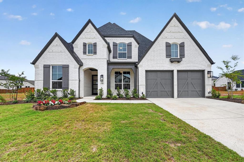 2 story, 5 bedrooms, 5 full baths, 1 half bath.  Beautiful exterior with steep roof.  Sliding doors leading to an extended outdoor living.  Extended primary bedroom.  Entertainment room downstairs. Expanded secondary bedrooms  with en-suite bathrooms upstairs.  3-car tandem garage.  South facing lot 66 x 125