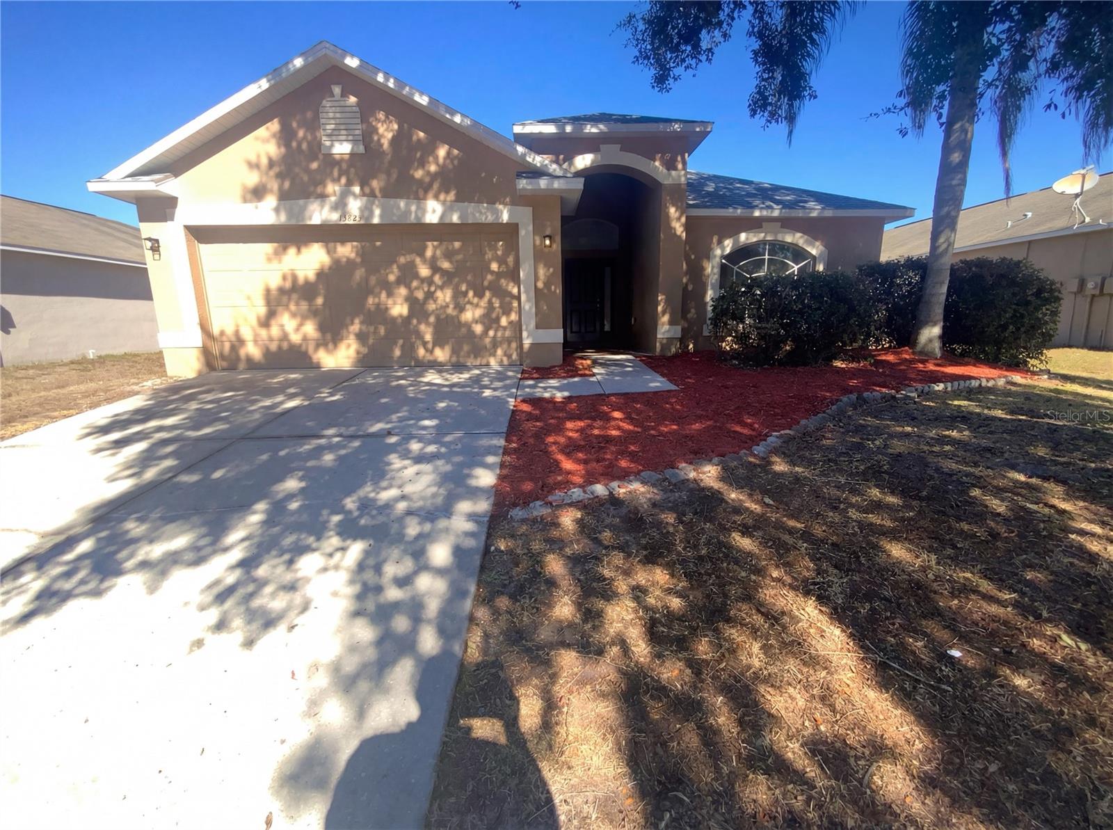 One or more photo(s) has been virtually staged. Welcome to 13825 Royston Bnd, a home that exudes elegance and comfort. The kitchen is a chef's dream, boasting all stainless steel appliances that add a modern touch. The primary bathroom is a sanctuary, featuring a separate tub and shower for ultimate relaxation. Double sinks in the primary bathroom ensure ample space for your morning routine. The primary bedroom is complete with a walk-in closet, providing generous storage space. Outside, a covered patio invites you to enjoy your morning coffee or evening read. The home's interior has been freshly painted, clean and bright living space. . Included 100-Day Home Warranty with buyer activation