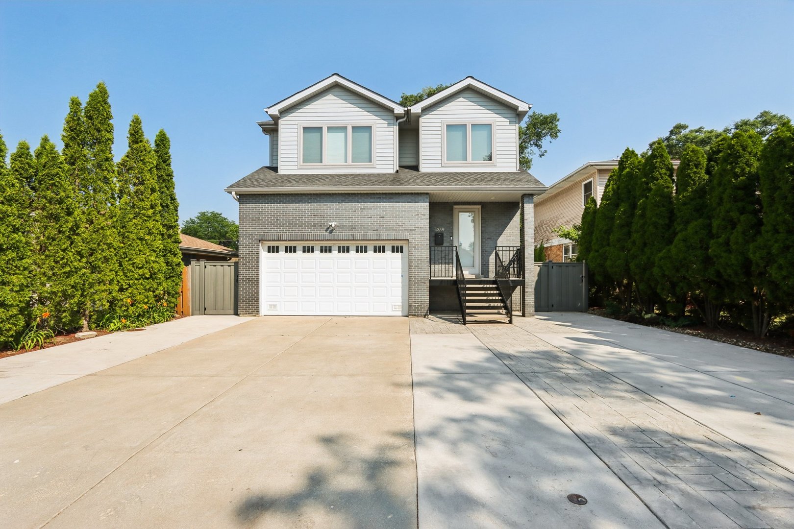 Stunning 5-Bed/4.5-Bth home in Chicago! This beauty is as good as new construction, built in 2016 and completely move-in ready. The moment you enter the front door you're greeted by a large and open living room, dining room and kitchen with gorgeous hardwood floors that flow throughout the home, recessed lighting and modern fixtures.  The kitchen is any home chef's dream with a large island with a breakfast bar, a built-in oven and microwave, quartz countertops, white shaker cabinets and a new fridge in 2024. Entertaining will be a breeze with this kitchen! Heading upstairs, you'll find your luxurious Primary suite complete with an en-suite bath with double sinks, a soaking tub and a separate European shower plus a large walk-in closet with a custom shelving system. The 2nd level also has 3 additional bedrooms (one of those includes it's own en-suite) and another full bath. The finished basement provides even MORE living space! It features a large rec room with a wet-bar, perfect for a game room, media room, playroom or whatever suits your needs. You'll also find the 5th bedroom and another full bath plus the laundry room in the basement. The laundry room was redone in April of this year and has a newer washer/dryer.  Outside, enjoy multiple outdoor living spaces in your private, fenced-in yard! The composite fence was installed in 2023. There is a balcony/deck off of the kitchen and a patio with a stunning pergola (new in 2023) that includes built-in lights and a ceiling fan - the perfect space to relax on these beautiful summer days. Turf was installed a few years ago, giving your lawn that perfectly manicured look! Attached 2.5 car garage ready for EV charging! There are also 31 solar panels on the house, installed in 2021, giving you peace of mind for your electric bill. You truly can't beat this home or it's location close to parks, multiple golf courses, major highways, public transit, groceries, restaurants and more! Easy to show - schedule your tour today!