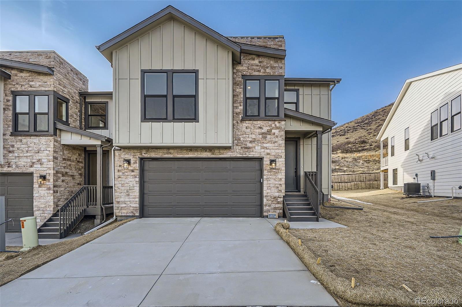 AVAILABLE NOW!  Brand new low-maintenance home in Castle Rock!

This Belford patio home backs to open space and is located next to the community amenity and features the stylish Summit Exterior with black framed windows.  Main level offers 10-ft ceilings with 8-in doors, office, and covered deck.  Design finishes include Maple cabinetry with dove tail and soft close drawers, tiled kitchen backsplash, KitchenAid appliances with a gas range & French-door refrigerator, quartz countertops with undermount sinks throughout, 12x24-in bath tile, and luxury EVP flooring.
 
Perfectly nestled on the west side of I-25 located minutes from downtown Castle Rock and close to shopping, restaurants, recreation, medical and everyday conveniences.  Enjoy the exclusive community park including a covered pavilion, pickleball & cornhole courts, green space sports field and access to regional walking and biking trails at the Ridgeline Open Space.  BLVD Builders is your boutique new homebuilder in the Denver area offering high quality features and Best-In-Class warranties.