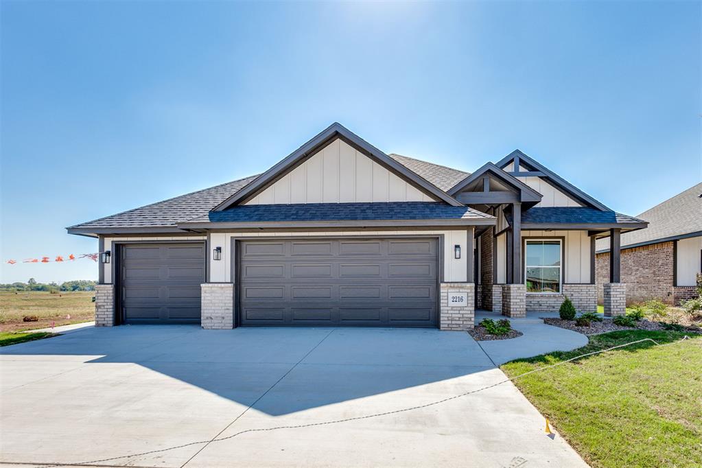This beautiful waterfront home in South Oklahoma City’s Sanabria community features an open floor plan with an impressive vaulted ceiling in the living and kitchen space, creating a bright and airy atmosphere throughout. Expansive windows fill the kitchen and living area with natural light while offering stunning views of the covered back patio overlooking the water.The spacious kitchen is equipped with state-of-the-art appliances and centered around a large island designed for gathering, entertaining, and everyday living. The private primary suite is a true retreat, featuring a standalone soaking tub, double-head walk-in shower, and oversized walk-in closet.Additional highlights include a beautifully designed fireplace, powder bath, convenient mud bench/drop zone, designer lighting, recessed can lights, gorgeous tile work, and granite countertops throughout.Residents of Sanabria also enjoy access to outstanding neighborhood amenities including a 4,500 sq ft clubhouse, resort-style pool, and fitness center, adding even more lifestyle value to this exceptional home.For a limited time only, builder incentives include a $3,000 Builder’s Special plus a $13,691 Early Bird Special. Builder will also pay closing costs with preferred lender partners. Home is MOVE-IN ready come tour this gorgeous waterfront home today!