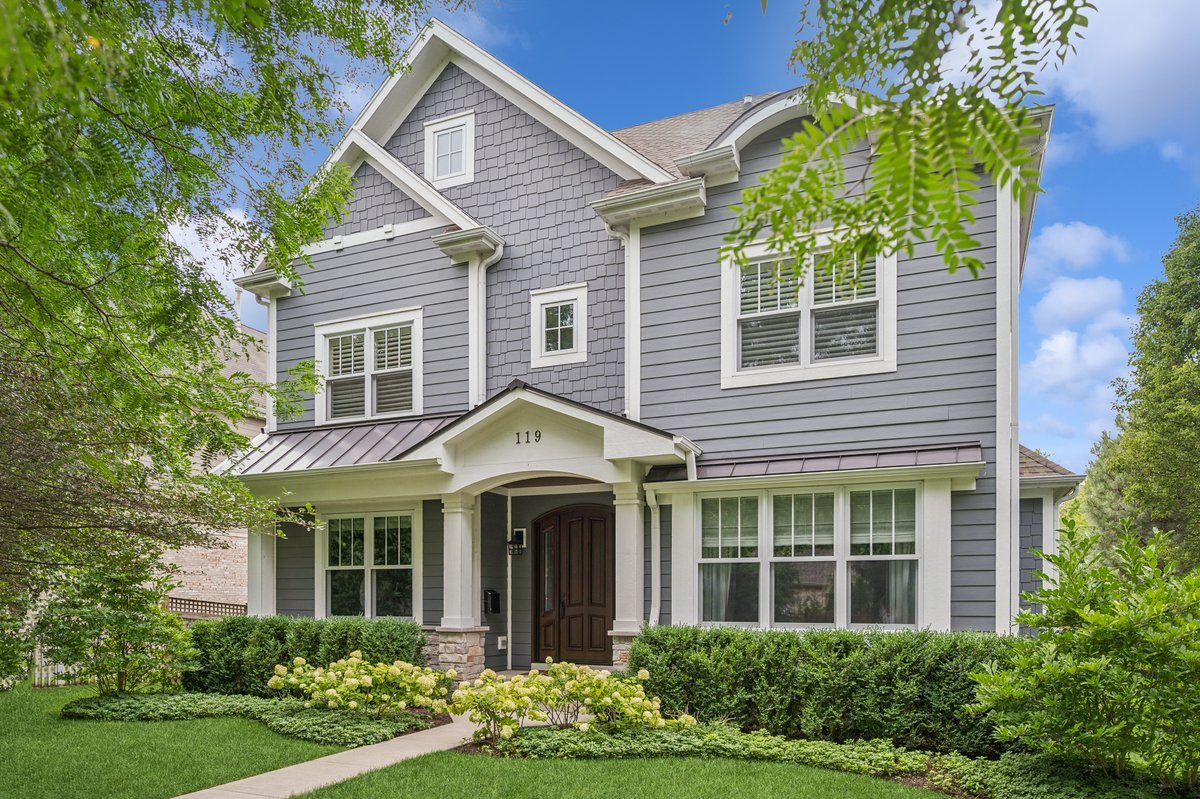 Welcome to 119 Sheridan Road, Wilmette-a home that perfectly balances timeless style with modern sophistication. This 4 bedroom, 4.1 bath newer construction residence is completely move-in ready and designed for today's lifestyle.    Step inside and you'll immediately appreciate the traditional millwork, gleaming hardwood floors, impressive ceiling heights and thoughtful designer lighting and wall coverings that add warmth and character throughout. The  circular floor plan offers incredible flow: a private office with French doors, a gracious dining room connected to a chic butler's pantry, and an open concept family room and kitchen at the heart of the home.    The chef's kitchen is a showstopper with custom in-line cabinetry, Sub-Zero, Wolf, and Miele appliances, and striking quartzite countertops and backsplash. The oversized island provides seating and style, while the adjoining breakfast area is perfect for casual dining. Sliding glass doors open from the family room to a spacious deck-ideal for al fresco meals overlooking the fully fenced, beautifully landscaped backyard.    Upstairs, the second floor hosts three bedrooms and two full baths, including a primary suite designed to impress. Enjoy the dream-worthy designer closet and a spa-like marble bath featuring a soaking tub and oversized steam shower.    The third floor offers flexibility with a full bedroom suite-currently serving as an office retreat but easily adapted for guests, family, or hobbies.    The lower level is another highlight, boasting soaring ceiling heights, a stylish family room anchored by a gas fireplace with fluted surround, a sleek wet bar, a designer gym, and a full bath.    A detached two-car garage completes this exceptional home.    All this in an unbeatable Wilmette location-just moments to Wilmette Harbor, Gillson Beach, Canal Shores Golf Course, Plaza del Lago, Evanston's Central Street, and Northwestern University. Wilmette Public Schools (Central Elementary, Highcrest Middle School, Wilmette Junior High) and New Trier High School District! With style, function, and location, 119 Sheridan has it all.