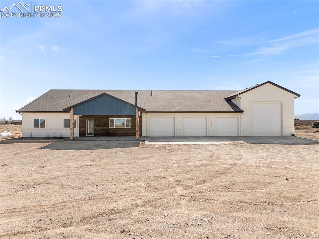 Welcome to this exceptional custom-built home, offering nearly 4,000 sqft of thoughtfully designed living space with high-end upgrades throughout. Nestled on almost 10 fenced acres, this property provides privacy, comfort, and modern elegance. Step inside to soaring Vaulted Ceilings and an inviting open floor plan, all climate controlled by in-floor radiant heat, forced air and enhanced by a wood-burning stove for cozy ambiance. (Home is efficiently climate-controlled with the installation of durable concrete wall construction.) The modern chef’s kitchen is a showstopper, featuring sleek black stainless steel appliances, including a gas range w/ hood, built-in microwave and built-in convection oven. Expansive primary suite boasts a walk-in closet and a spa-inspired 5-piece bath with a freestanding soaking tub and a luxurious spa shower. 3 additional bedrooms offer flexibility, with one currently used as a gym/workout room. Work from home with ease in 2 dedicated office spaces, and enjoy the convenience of a large storage area with built-in shelving. The 4-car garage expands into an additional garage bay w/ drive through oversized doors and ample storage space- perfect for a home based business, RV storage, a workshop, or your outdoor toys. Outside, relax on the covered front and back patios, or unwind in the sunroom with amazing views of the Mountains. This one-of-a-kind estate blends modern luxury with country living—don’t miss the chance to make it yours!