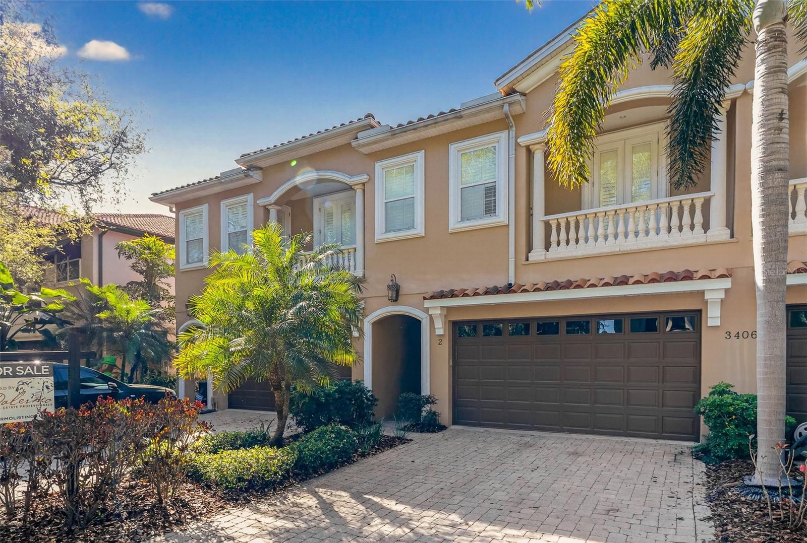 Under contract-accepting backup offers. Live just blocks from iconic Bayshore Boulevard in the heart of Palma Ceia, one of South Tampa’s most desirable neighborhoods. This beautifully maintained 3-bedroom, 2.5-bath townhome with a two-car garage offers spacious living, modern upgrades, and walkable access to some of Tampa’s best restaurants, boutiques, salons, and neighborhood conveniences.Inside, the home features wood flooring, crown molding, plantation shutters, and high ceilings, creating a bright and inviting atmosphere. The open kitchen, living, and dining area is ideal for entertaining and everyday living, complete with wood cabinetry, granite countertops, stainless steel appliances, and a large center island. The living area is enhanced with six Polk ceiling surround sound speakers for an elevated entertainment experience. Upstairs, the primary suite offers a spacious layout with a large walk-in closet and en-suite bath featuring granite countertops, garden tub, separate shower, and updated glass enclosure. Two additional bedrooms provide generous space and storage, while the versatile loft area is perfect for a home office, playroom, or fitness area. The laundry room is conveniently located on the second floor and includes washer and dryer. Recent upgrades include two new Daikin A/C systems with updated air handlers and condensers, a Halo whole-home water filtration system, and a Tesla charging station installed in the two-car garage. Additional improvements include fresh interior paint, updated bedroom carpeting, and enhanced shower glass in the primary bath.Step outside to enjoy the private fenced backyard featuring newly installed turf and a wood deck, creating a low-maintenance outdoor space ideal for relaxing or entertaining. Ideally located near Bayshore Boulevard, Hyde Park Village, Palma Ceia Golf & Country Club, downtown Tampa, and top-rated dining and shopping, this home offers the perfect combination of location, comfort, and the South Tampa lifestyle.