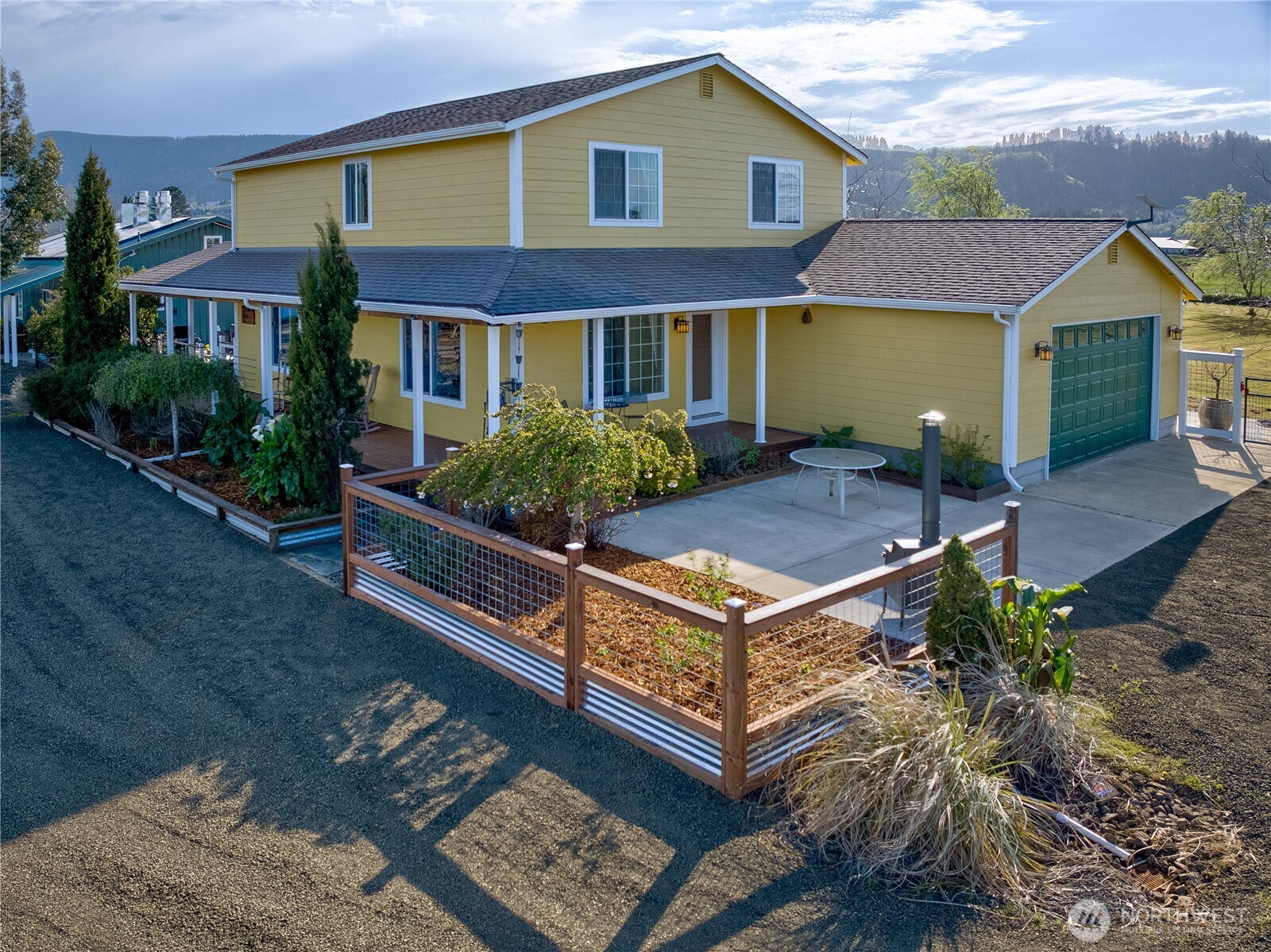 A true horticultural haven and very edgy gentleman’s farm on 19 acres with two different tax lots. The farm is located on a quiet but fashionable island in the middle of the mighty Columbia River. Arrive by ferry from the Oregon side or by a bridge from Washington . A gated entry and private drive bring you by a sweet looking  productive olive orchard and grove, and then that leads you to a tony and romantically inspired farmhouse with reminiscent Provençal decor! The owners have created a true encompassing gardenesque setting. There is a guest house that is separated by a stylish covered entertaining deck and patio with relaxing views of the farm and territory. The guest quarters includes a 600 sq ft commercial kitchen for many cooking endeavors, including the possibility of a “ seed to table “ lifestyle for your family and friends. Attached to the kitchen is a south facing 1,100 sq ft greenhouse added in 2017. There are two perfectly operating hoop houses and additional fully fenced gardens. The large pole barn, which has electricity and water, also has a shop with wood stove heating. Create or add your own artistic endeavor here, there is plenty of room for expansion!  Showing by appointment only.