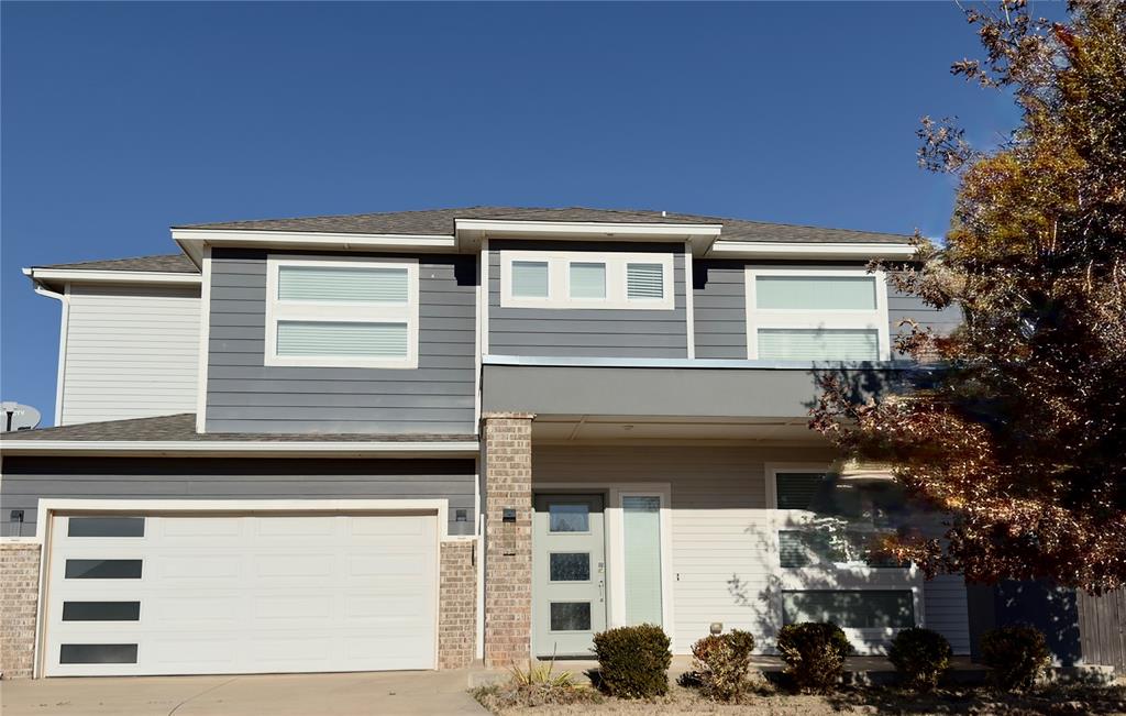 This modern two-story home in Chisholm Creek Farms offers a great floorplan that truly works for everyday living and entertaining. The primary suite is located on the main level and features double vanities, a soaking tub, and a spacious walk-in closet with direct access to the utility room. The open-concept layout connects the family room, dining area, and kitchen, making it perfect for gatherings. Upstairs, you’ll find three additional bedrooms, a full bath, and a flexible bonus space ideal for a playroom, media room, or home office. Located on a quiet cul-de-sac, this home is a true gem you don’t want to miss!