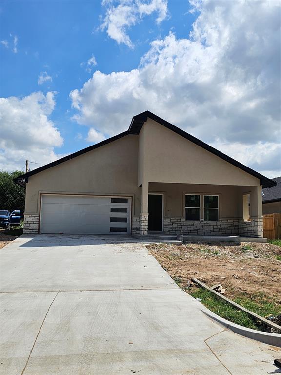 This home combines both daily comfort and modern style. Brand new construction Features 4 Bedrooms, 2 full bathrooms and 2 car garages. Inside, enjoy an open-concept living & dining space, kitchen with an island, granite countertop, pantry, plenty of natural light and tiled floors thought out the house. The primary Master bedroom comes with a walk-in closet, beautiful tiled tub to relax, separate tiled shower, double vanity sink and a private toilet. Outside, a covered porch offers a perfect spot for relaxation. This home is contemporary living with convenient easy access to main highways, downtown, shops, restaurants, etc.