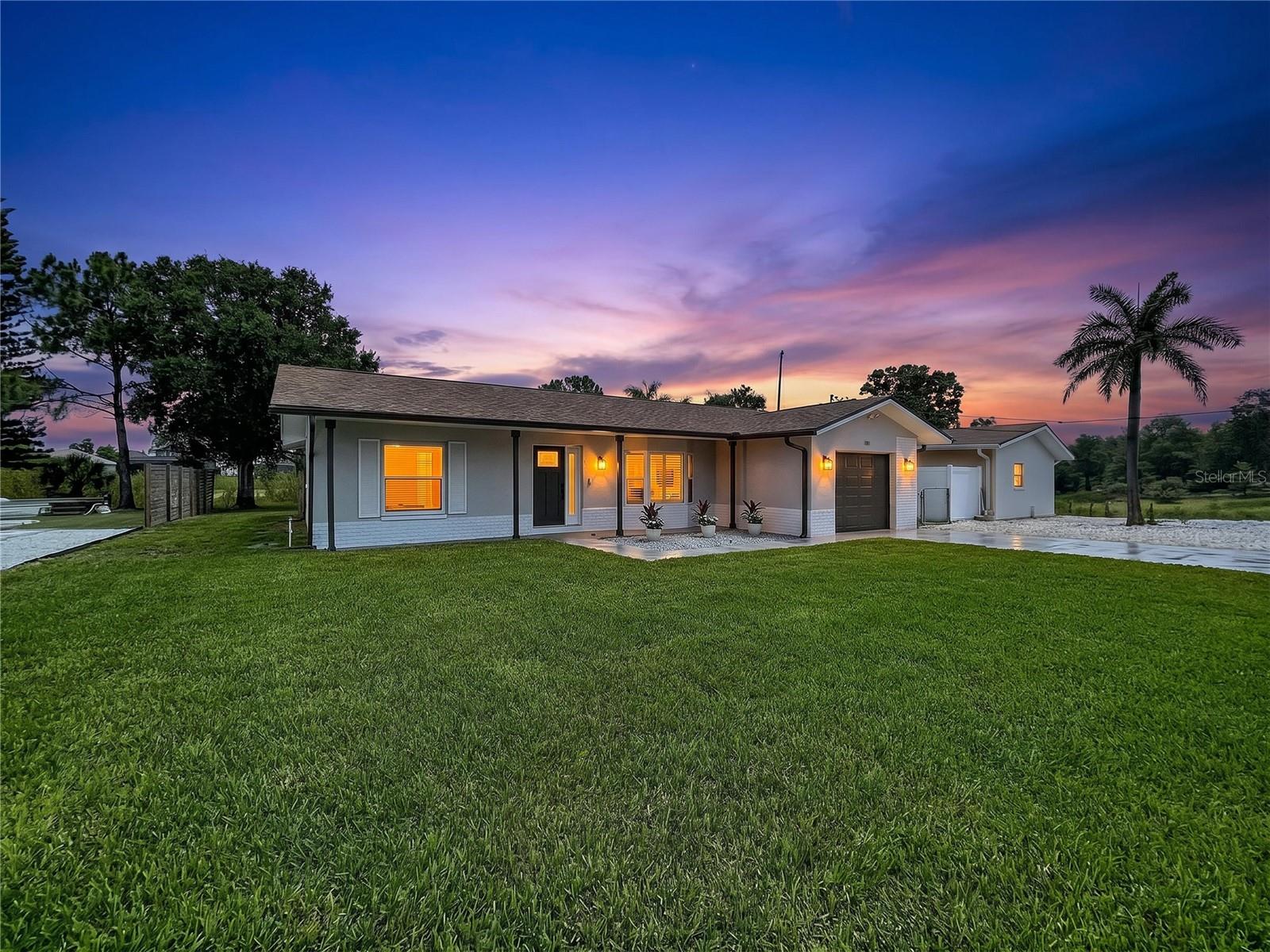2BR/2BA home in Baywood Village, Palm Harbor. Fully renovated. Golf cart community.Renovated from top to bottom, and the flexibility of a golf-cart-friendly community make this 2-bedroom, 2-bathroom home a standout opportunity in Baywood Village, one of Palm Harbor's sought-after neighborhoods. Offering 1,396 square feet of living space on a .18-acre lot, this move-in-ready residence combines modern updates with the character of classic Florida living. With no HOA restrictions and no leasing restrictions, the property may appeal to buyers seeking a primary residence, seasonal retreat, or investment property.Inside, nearly every surface and system has been updated. The redesigned kitchen features custom soft-close cabinetry, quartz countertops, an LG appliance suite, a Bosch Home Connect dishwasher, black hardware throughout, and an open-concept layout that connects seamlessly to the living and dining areas. The spacious primary suite includes a renovated en-suite bathroom with a custom tiled shower, designer vanity, and walk-in closet ready for customization. A generously sized guest bedroom, additional storage closets, updated flooring, fresh interior paint, new doors, and upgraded molding continue the home's comprehensive renovation.The Florida room adds warmth and personality with a blend of Old Florida charm with modern finishes. Whether entertaining guests or enjoying a quiet evening at home, this flexible living space offers year-round enjoyment.Major improvements provide added peace of mind, including a roof replaced in 2022, flat roof replaced in 2020, Trane HVAC system installed in 2024, water heater replaced in 2024, front yard irrigation, gutters, smart security cameras and lights, fresh exterior paint, and a new hurricane-rated garage door. The home benefits from extensive documented updates.Outside, the large backyard creates an ideal setting to enjoy tranquil wildlife views. In the front-yard the new sod and landscaping enhance curb appeal while providing a fresh outdoor environment for relaxation, gardening, or future customization.Baywood Village is known for its golf-cart-friendly atmosphere, and active community lifestyle. Residents enjoy access to a clubhouse, playground, community events, golf cart parades, fishing tournaments, chili cook-offs, and planned recreational amenities. The location places you close to Honeymoon Island, Fred Howard Park, Sunset Beach, Wall Springs Park, the Pinellas Trail, Innisbrook Golf Resort, shopping, dining, and everyday conveniences. Tampa International Airport and St. Pete-Clearwater International Airport are also easily accessible.Fully renovated, move-in ready, with exceptional flexibility, this Palm Harbor property presents a rare opportunity to own in one of the area's hidden gem neighborhoods.Room sizes are approximate – Buyer must verify.  PLEASE CLICK VIRTUAL TOUR LINK.