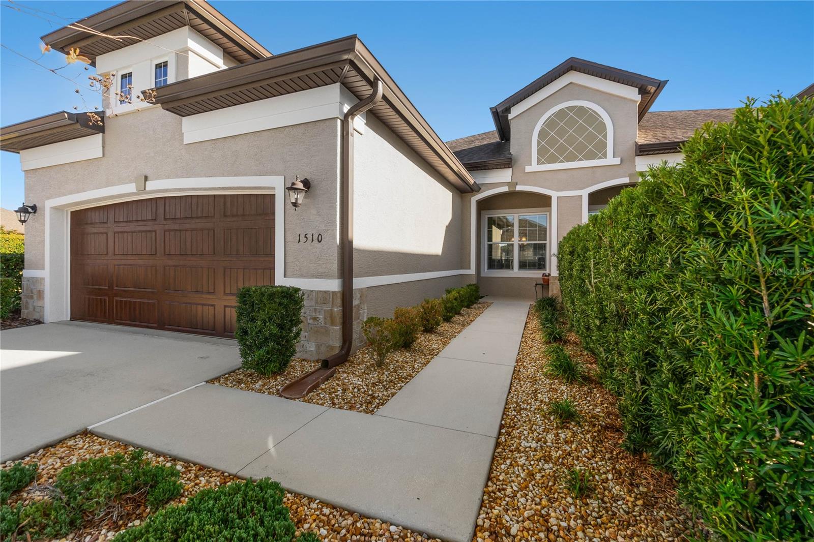 BEAUTIFUL views and maintenance free townhome available in Halifax Plantation with freshly painted interior. Walk through the private entry through your GLASS front door. You are greeted with OPEN floor plan and HIGH ceilings! Kitchen is finished with GRANITE countertops, 42in WOOD cabinets with soft-close feature, stainless steel appliances, & sun tunnel for lots of natural light, paired with Breakfast nook, anchored at front of home with TILE floors and large windows. Kitchen also opens onto the Dining Room with lofty ceilings and crown molding and flows into the Family Room with splendid views of the LAKE and FOUNTAIN, triple sliders out to lanai, & sun tunnel for natural light to filter through. Private Master Bedroom with relaxing views of the lake, tray ceiling with crown molding, walk-in closet, plus En-suite bathroom. Master Bath has 2 sinks, long vanity, soaker tub, & walk-in TILE shower. Bedroom 2 is great size and offers private views out the side windows. Bedroom 3 is also nice size, great for guests! Bathroom 2 has GRANITE countertops along with TILE tub/shower combo. Bedroom 3 and Bathroom 2 have a pocket door to create a suite area. Townhome is finished with interior laundry area, 2 car garage, and the best part-- a large LANAI overlooking the LAKE and fountain!! Great, long views looking down the lake and no neighbor to one side makes for a beautiful setting. Completely MAINTENANCE FREE and easy walking distance to private PICKLEBALL and putting green! 5 mins to amenities with grocery store, restaurants, etc. Truly turn-key with furnishings available.