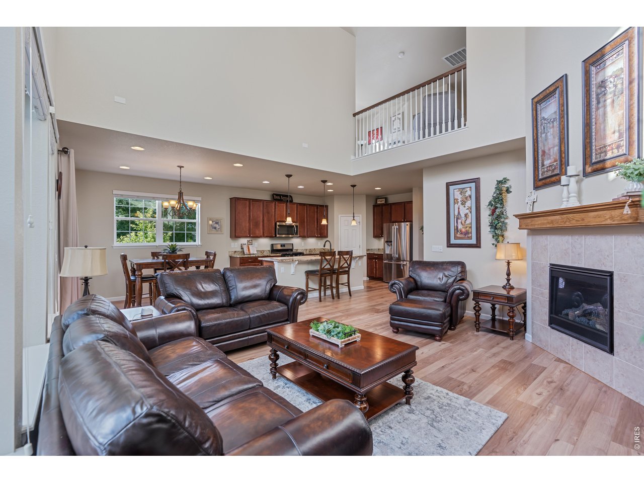 The wow factor you've been waiting for! This beautifully updated home is filled with an abundance of natural light and features an inviting, open floor plan designed for comfortable everyday living and effortless entertaining. Pride of ownership shines throughout with exceptional care, thoughtful updates, and newer flooring and carpet that create a fresh, move-in-ready experience. For added peace of mind, this home has been pre-inspected, professionally cleaned, and includes all home appliances. The professionally finished basement includes a full second kitchen, offering incredible flexibility for guests, extended stays, multigenerational living, or additional entertaining space. Situated on a desirable corner lot, the property features low-maintenance landscaping (lawn only in front yard), spacious 3-car attached garage with storage shelving, providing ample room for vehicles, tools, and hobbies. Step outside to your private backyard retreat featuring an oversized Trex-style deck with an included hot tub, creating the perfect outdoor oasis for relaxing or entertaining year-round. All trees, plants, and front yard grass are on an irrigation and drip system, making landscaping a breeze. Features include: newer class 4 roof, designated home office space, newer flooring and carpet throughout, professionally finished basement with full kitchen, all home appliances included, corner lot, irrigation system for lush landscaping, outdoor sound system. A rare combination of space, functionality, and updates in a highly desirable Kechter Crossing community near parks, trials and top level schools and health care. Schedule your private showing today. This exceptional home won't last long!