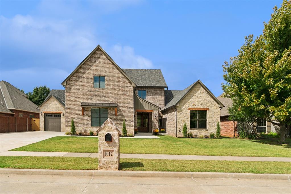 This BRAND NEW home is a West Norman dream in the very desirable Arbor Lake addition! This is the final lot to be built on in the neighborhood, so it is truly your last chance to get a new home here.  Attention to every detail by this builder! This thoughtfully designed home is 4 bedrooms or 3 + a study, 3 full bathrooms, a large upstairs bonus/living room, an extra 11 x 8 room was added upstairs (not on floorplans) that could easily be a work out room or hobby room. The home features a luxurious open floor plan, perfect for entertaining or relaxing! Lots of windows to allow light throughout the home. Find gorgeous hardwood floors throughout and beautiful custom cabinets, as well as 8 ft doors. The kitchen includes a huge island and features high end Kitchen Aid appliances with a gorgeous butler's pantry behind it with an extra sink. Quartz countertops throughout the home as well as on the window sills. Primary bath includes a freestanding tub and separate shower with stylish dual quartz vanities and an oversized walk in closet with direct access to the laundry room. The oversized 3 car garage include windows in the top of the doors and includes an in ground storm shelter. There is even a garage door on the back of the single car garage to make it easy to access the back yard. The backyard has a large covered patio for outdoor living and even has room for a pool if desired. The home also includes a full gutter system and a sprinkler system in the front and back yard to make taking care of the yard easy. Fully fenced back yard. Includes a security system for extra peace of mind. Comes with a 1 year home warranty. On top of all the luxuries that this home provides, you can't beat the location! Stroll to the nearby playground or go fishing in the neighborhood lake. Prime location to dining, schools, and you can even walk to some of Norman's best shopping in Brookhaven Village which also includes a Starbucks.