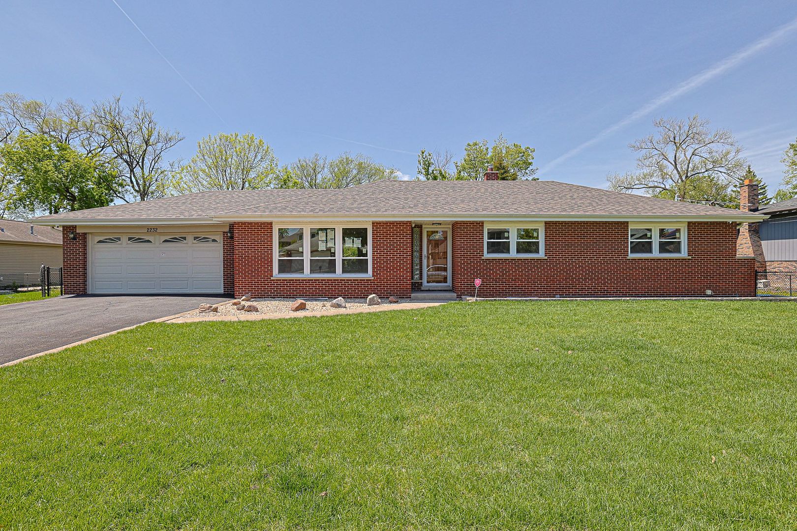 Welcome to this totally remodeled double plot(131X154) all brick ranch house in a quiet neighborhood with charming curb appeal. Features include a kitchen with brand new SS Appliances, Granite counter tops, Hood under the cabinets, SS 16-gauge Workstation sink with Faucets, dimmable recessed lights and hardwood flooring. The dining room has brand new hardwood flooring and ceiling light. Refinished hardwood flooring in the living room and brand-new ceiling light with remote. Master suit has refinished hardwood flooring, ceiling fan with light and an attached brand-new private bathroom with tub. A brand-new common bathroom with standing shower with bench and glass door. A fully finished basement with a brand-new half bath with an option for full bath, staircase, a bedroom with walking closet, 100 AMP electrical Panel with breakers and wiring, foam insulated and moisture barrier painted walls, waterproof luxury vinyl flooring, dimmable recessed ceiling lights and two exhaust fans installed for more fresh air. The laundry room has a brand-new washer and dryer, sink with faucets, a closet for storage, and a sump pump with battery backup. The Utilityy room has a brandd-new 97% high efficiency HVAC with 20 years of warranty with labor and parts, 50 gallons AO Smith water heater and an ejector pump. All brand-new windows, all doors& closet doors, locks, brand new roof with attic fan, 6 new window wells, 100% plumbing with blue copper pipe, 100% gas pipes and 100 % PVC drainage pipes. Brand-new interconnected smoke and carbon monoxide alarm, thermostat & cable and doorbell & wires. Brand new epoxy flooring with polyurethane coatings in the attached 2 cars garage, electrical fixtures with a provision for EV charging. This house is filled with natural lights and sits on a fully fenced huge backyard with a deck and a shed with new roof and door. A brand-new soffit installed around the house and fixtures around the Electric Meter with grounding system.  Professionally landscaped with new grass (SOD) in the frond and both sides of the house, brick garden beds and resurfaced driveway.  A brand-new PVC sewer pipe around 45 feet from the first cleanout to the main sewer.  Reolink security cameras with 2TB storage space for additional security. 90% of the house is brand new.  This is an asset to build two houses in the future. All the works were done with village permits and inspection. Close proximity to Lake Opeka, Highways and Airport.