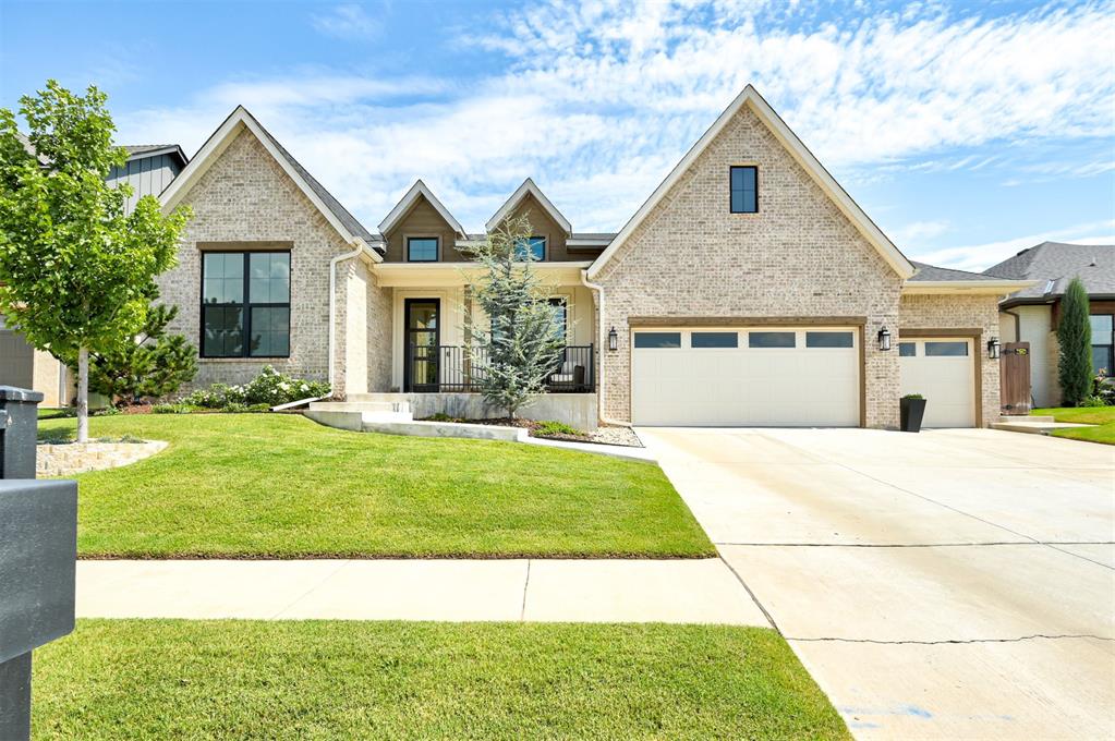 This 4-bedroom, 3-bath home offers 2,635 sq. ft. of bright, timeless living in one of Edmond’s premier gated communities. The spacious living room showcases a soaring vaulted cathedral ceiling with beams and opens seamlessly to the kitchen with a large island/breakfast bar, walk-in pantry, and elegant finishes. A dining area just off the kitchen makes entertaining easy. The private master suite features a convenient pass-through to the laundry room and a spa-like bath with double vanities, free-standing tub, separate shower, and two oversized walk-in closets. Two bedrooms share a bath, while a fourth bedroom or study with closet enjoys access to a full guest bath. Additional highlights include a mudroom, 3-car garage with epoxy flooring, and a covered patio overlooking the tree-lined backyard. Stone Hill at Iron Horse Ranch offers the perfect location with quick access to I-35, and Edmond’s best shopping, restaurants, theater, and exciting new developments—all within Edmond Schools.