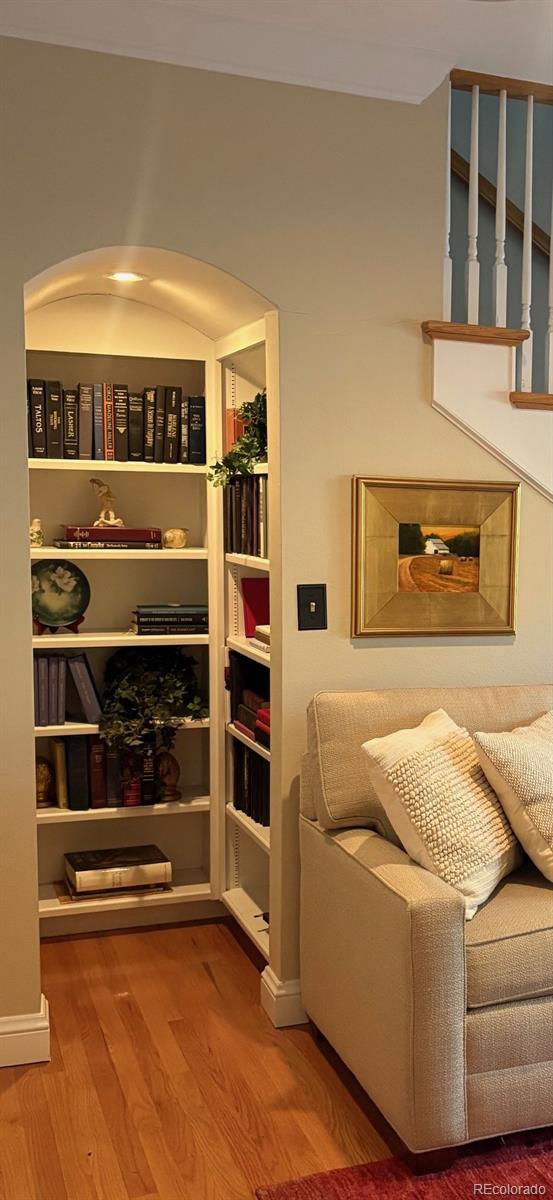 Showings start May 1. Professional photos coming 4/28. Warm, welcoming and full of charm in the True Heart of Bonnie Brae.  A picturesque, sun-drenched home presented on an elevated lot.  The welcoming porch and upper-floor window boxes frame the views of Bonnie Brae Park, just steps away!  This 1953 Mid Century was reimagined by the current owners into a beautiful Parisian influenced, character filled home, suited to a variety of buyer needs.  Step into the spacious living room with fireplace.  Hardwood floors, cove ceilings, detailed moldings and an open layout. Main floor full bath with jetted tub and glass shower, two main floor bedrooms, abundant storage and closet space.  Inviting layout includes a large dining area, family room with gas fireplace and a cozy library nook you will love!  The stunning open kitchen offers miles of granite counter space, custom cabinetry, bar seating and upgraded appliances.  Southern exposure, filled with light, an exceptional gathering and cooking space! The second floor offers a flex space-office, den or bedroom-stunning floor to ceiling built-in shelving and south facing oversized window.  The Primary suite – well, it’s dream! Vaulted ceilings, eyebrow dormers. Glorious views to the park from the double French doors.  Read your favorite book by the gas fireplace.  Ensuite bath with dual vanities, glass shower, separate water closet and two massive adjoining walk-in closets!  Open the full light French doors to the backyard.  A retreat with grey flagstone patio, plenty of room to entertain and easy maintenance artificial turf. A two-car garage and extra off-street parking are a plus.The basement provides an additional 600+ square feet-recreation room with fireplace, storage, furnace/utility room and a ¾ bath.  Newer windows and systems, immaculate care.A rare offering, multi-generational uses.  This one is a treasure, sure to please. Show and sell!