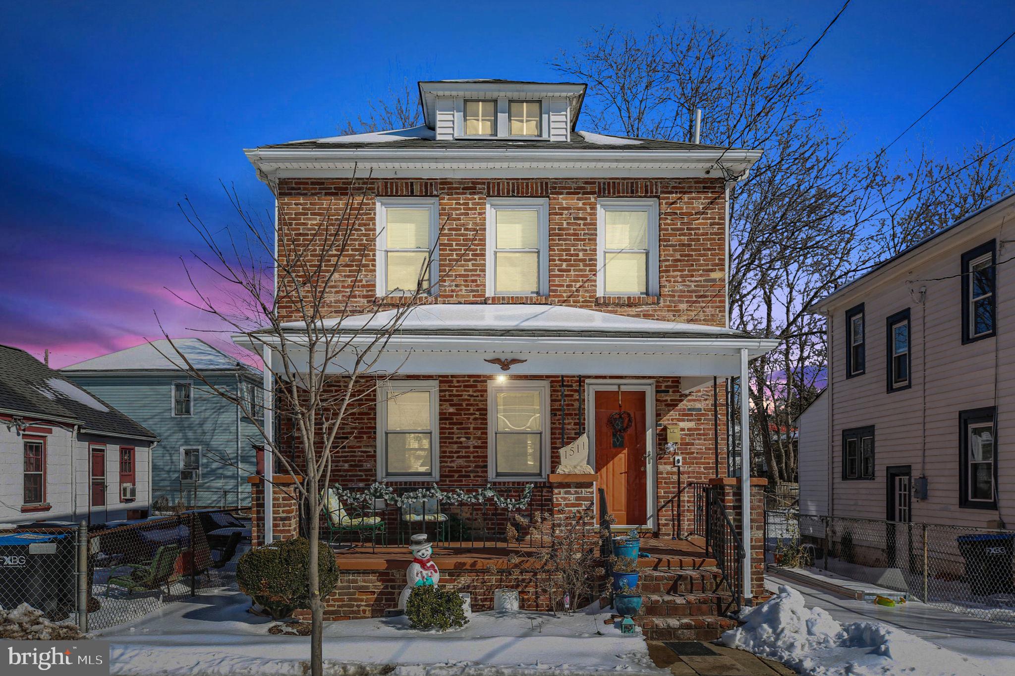 Some homes just feel like a hug the moment you enter. This is one of them! This is a very sweet and well loved home and garden located within walking distance of all downtown living has to offer. Wake up and feel like a yoga class or catching an art show, just walk across the street to the community center which  offers lots of activities throughout the year.  All brick exterior with front and back porch to enjoy the breeze come summer. The main level has a family room, dining room and Kitchen and the upper level has 3 comfortable sized bedrooms and one bath.  Kitchen has 42 inch cabinetry with grantite counters. Hard wood flooring throughout. Bright and beautiful inside and out.The basement is used for storage. Out back is a lovely flat yard with lots of seasonal plantings, such Azaleas, Comfrey, Hydrangea, and many others. It is not easy to find a nice home like this in this price bracket downtown so schedule your showing today to see if this is the one for you!