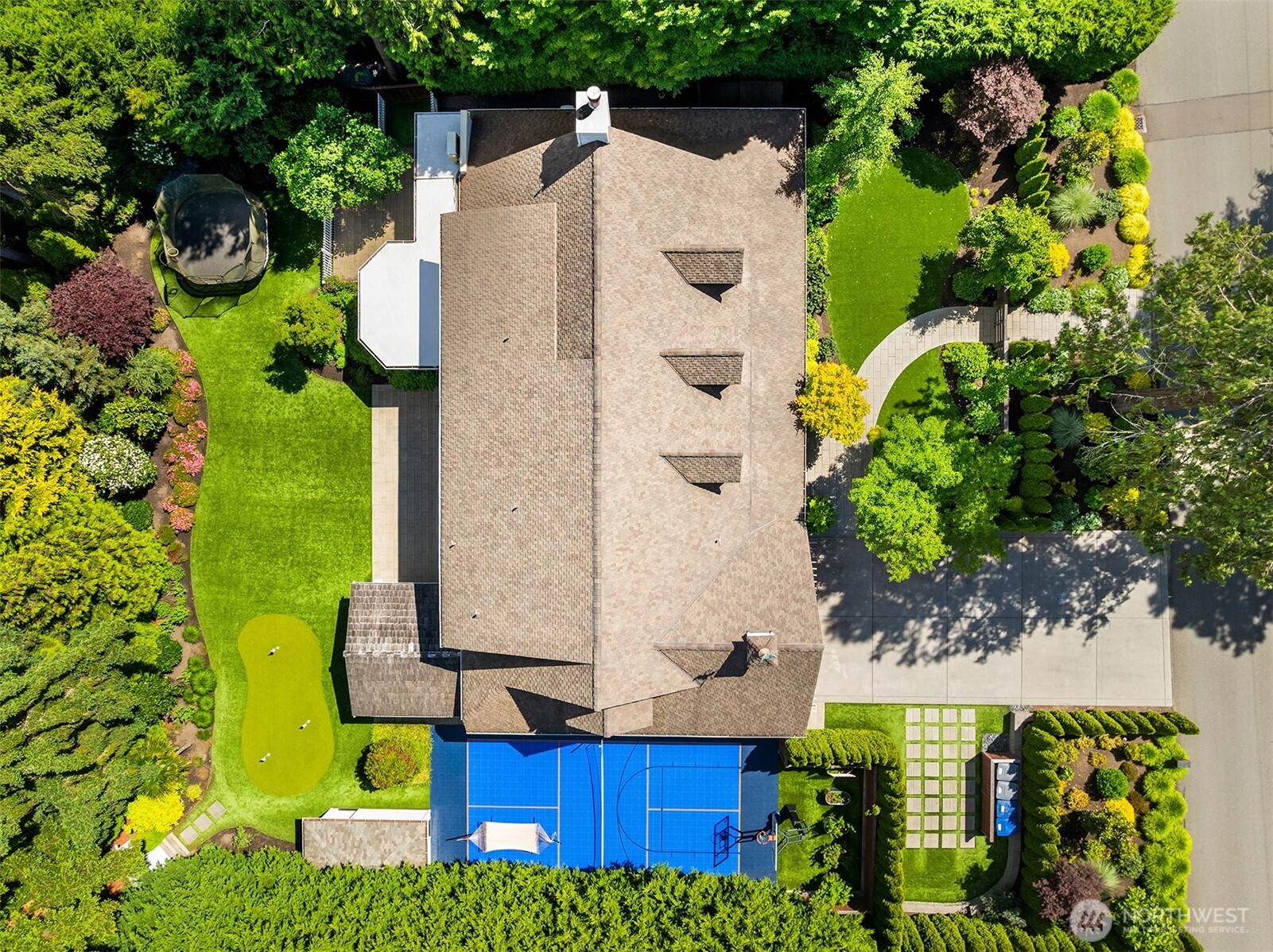 Aerial view captures the resort-style backyard