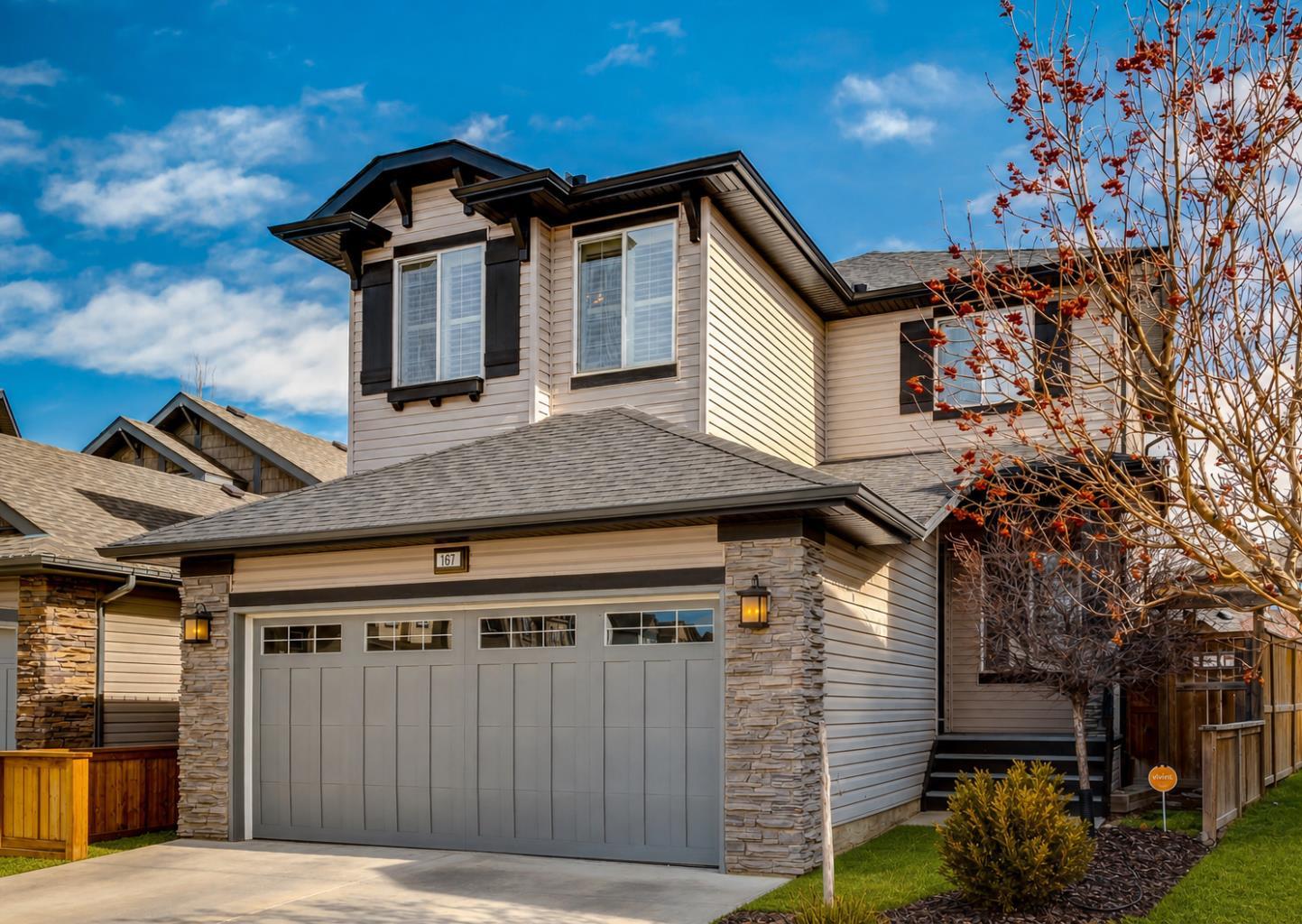 Welcome to New Brighton, where elevated living meets everyday comfort in this exceptional two-storey home. Perfectly positioned on a rare, professionally landscaped pie-shaped lot that offers your own private backyard oasis. From the moment you step inside, the pride of ownership is unmistakable. The bright, open-concept main floor is designed to impress, featuring rich yellow birch hardwood flooring, a dedicated home office, and a spacious great room with gas fireplace ideal for both relaxing and entertaining. At the heart of the home is a chef inspired kitchen, complete with granite countertops, upgraded stainless steel appliances, and an abundance of natural light from oversized windows. A convenient mudroom with laundry adds to the home’s thoughtful functionality. Upstairs, a versatile bonus room creates the perfect family retreat, ideal for movie nights or a play space, while three generous bedrooms provide comfort for all. The primary suite is a true sanctuary, offering a spa inspired ensuite and a large walk-in closet. What truly sets this home apart is the professionally developed basement, delivering incredible value and flexibility. With a generous recreation area, three additional bedrooms, a full bathroom, and ample storage, this is a rare 6 bedroom home, perfect for growing families or multi-generational living. Designed for everyday comfort, the home features a multi-zone furnace system with dedicated climate control for each level. Step outside and experience your own private escape with an expansive deck that enjoys a sunny South exposure. The yard is beautifully landscaped (complete w/irrigation) and fully fenced and is perfect for entertaining or unwinding. Located just minutes from New Brighton’s sought after clubhouse, parks, and sports fields, and with quick access to Deerfoot Trail and Stoney Trail, this home offers the perfect blend of luxury, space, and convenience. This is more than a home, it’s a lifestyle. Come experience it for yourself.  Note- some exterior photos have been digitally altered or virtual staging.