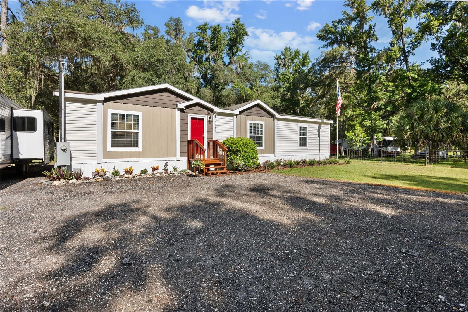 Lakefront Country Living at Its Finest
Escape to 4.5 acres of peaceful lakefront beauty where every day feels like a retreat. This 2017-built 3-bedroom, 2-bath home features a split floor plan for privacy, a spacious kitchen with new stainless appliances perfect for gatherings, and a large master en suite with a soaking tub for ultimate relaxation.

Recent updates — including new carpet, fresh paint, a 2020 pool with composite decking, and a new pool pump — make this home feel fresh and move-in ready. Step outside to enjoy beautifully landscaped grounds, an inviting pool area for summer fun, and plenty of space for entertaining. A 30x30 metal workshop with full power, 30-amp RV plug, electric gate, and classic board fencing combine functionality with timeless rural appeal.

Wildlife lovers will appreciate the regular visits from turkeys and deer, and the lakefront setting offers endless opportunities for fishing, kayaking, or simply soaking in the peaceful water views.

Whether you’re seeking outdoor adventure, room to roam, or a serene escape, this property delivers the lifestyle you’ve been dreaming of.
2 Parcels being sold together equally 4.5 acres