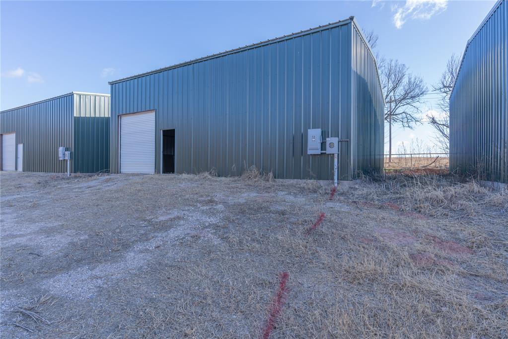 Explore the potential of these spacious, open-concept commercial rentals located right on the corner of Waterloo Road and Kelley Avenue. These are clean, empty metal shop buildings featuring soaring 16-foot ceilings, offering a versatile blank slate for any new or established business owner. Currently in shell condition, these units provide the height and square footage needed for equipment, inventory, or a custom build-out. Position your business at a high-visibility Edmond intersection and finish the space to suit your specific needs.