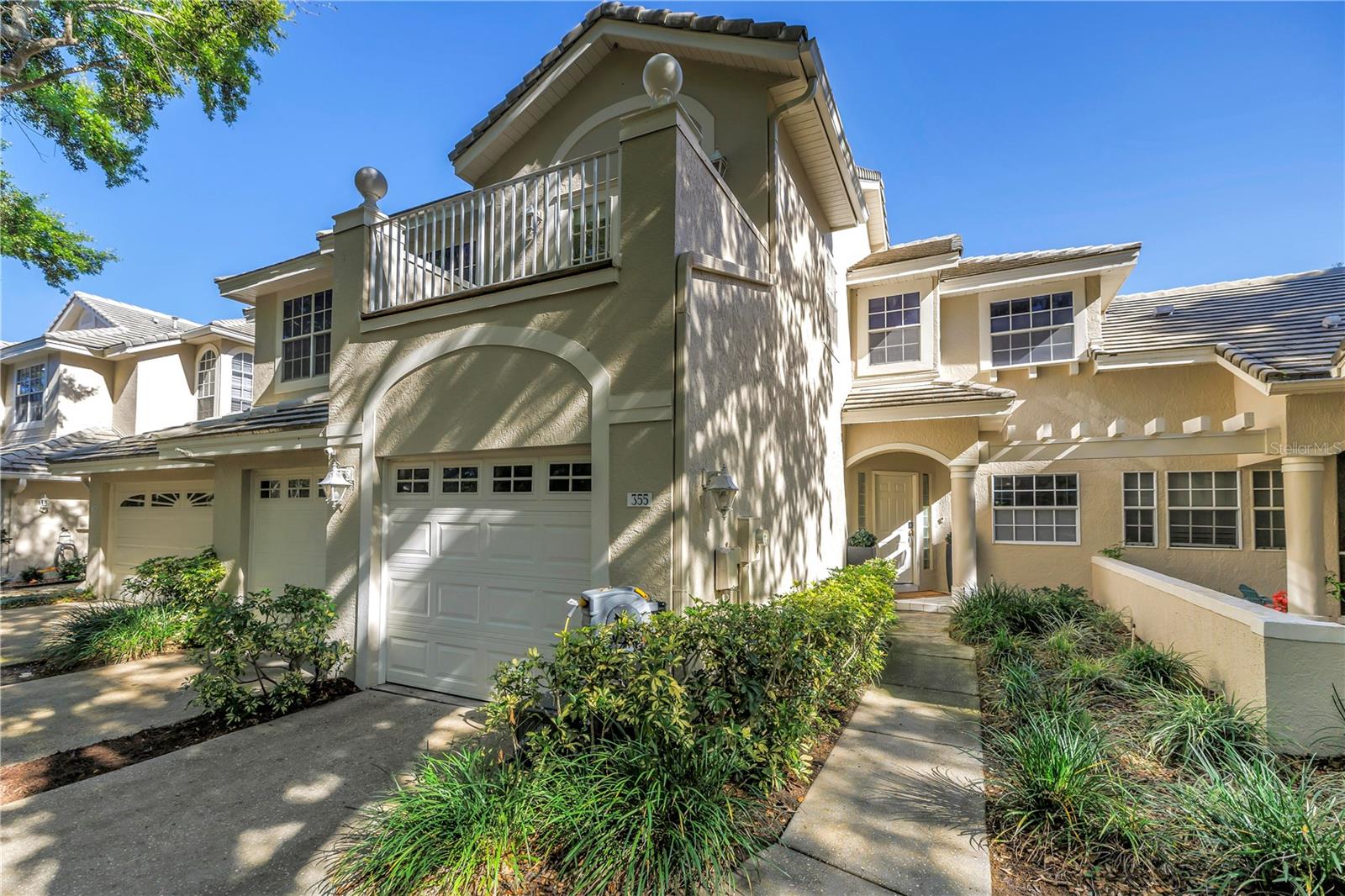 THE APOGEE OF MODERN MINIMALISM IN GUARD-GATED PLACIDO BAYOU | LARGEST TOWNHOME LAYOUTProudly presenting the largest townhome floorplan in highly desirable Placido Bayou. Spanning 2,146 square feet, this stunning 3-bedroom, 2.5-bathroom residence was completely reimagined in 2022 with a relentless commitment to quality, offering a masterclass in clean-lined, modern design. Enjoy a premium, "lock-and-leave" coastal lifestyle defined by structural precision and minimalist luxury.Architectural Precision: Step into a gallery-like interior featuring soaring vaulted ceilings and modern smooth-finish walls—a rare, high-end upgrade that provides the ultimate crisp canvas for fine art. The home is bathed in natural light, accented by designer fixtures, structural lines, and custom 2022 window treatments.A Chef’s Masterpiece: The heart of the home is a 2022 custom-remodeled kitchen designed for the culinary enthusiast. It features a professional, flush-profile suite of high-end Bosch 800 Series appliances (Induction Cooktop, Oven, Microwave, Dishwasher, and Refrigerator) complemented by a premium Summit beverage and wine refrigerator. This space delivers flawless function and minimalist beauty.Spa-Inspired Retreats: The 2022 bathroom renovations rival a five-star boutique hotel, featuring sleek Duravit wall-mounted toilets, a freestanding soaking tub, and a zero-entry rain shower. Practicality is just as premium, with a 2022 LG ThinQ washer/dryer suite and a Wyze security system for peace of mind.Outdoor Oasis & Critical Upgrades: Experience the Florida lifestyle on your private, newly paved backyard patio featuring a dedicated grill station—perfect for alfresco dining under the stars. For the ultimate in comfort, the home boasts an Ultra-Quiet Amana AC unit (2024). An oversized 2-car garage completes this rare offering.Experience the rare intersection of generous square footage, fine finishes, and high modern design. Schedule your private tour of this Placido Bayou masterpiece today.