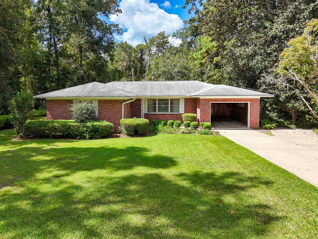 Welcome to 601 Partridge Drive, a 3-bedroom, 2-bath home situated on a beautiful 1.41-acre lot in a convenient Thomasville location. With 1,869 square feet of living space, this home offers plenty of room to enjoy today along with the opportunity to make it your own over time. One of the highlights of the property is the large, private backyard—a peaceful setting where deer and other wildlife are frequent visitors. Enjoy your morning coffee or unwind at the end of the day from the screened porch while taking in the quiet surroundings. Inside, the home features a comfortable floor plan along with a spacious bonus room highlighted by a large picture window overlooking the backyard. This flexible space would make a great second living area, home office, playroom, or den.  With over an acre of land, mature surroundings, generous outdoor space, and a desirable Thomasville location, 601 Partridge Drive offers something increasingly hard to find: room to spread out while still being convenient to town. Whether you're looking for a home to enjoy as-is or a property you can update over time to fit your style, this one offers plenty of potential.