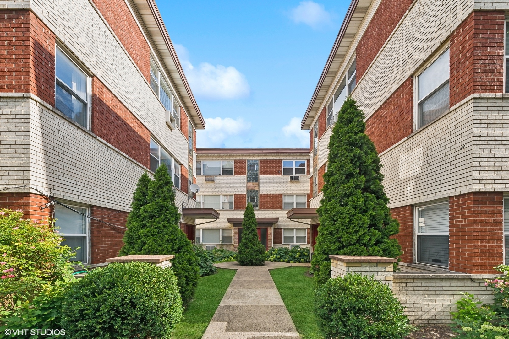 Nestled in a cute 1960's building with a courtyard entry, step inside this corner top-floor unit and appreciate the hardwood floors throughout.  The living room flows into the eat-in kitchen and windows with both eastern and western exposure bring cross breeze and light into the space.  Enjoy large bedrooms with ample closet space, as well as the convenience and comfort of central HVAC.  The owners have loved the location on a tree-lined street, close to River Park, Lincoln Square and Ravenswood.    The building is investor-friendly with no rental restrictions and low assessments, offering a great opportunity for those looking to grow their portfolio.     Additional storage and laundry in building. Future owner may install laundry in the unit.