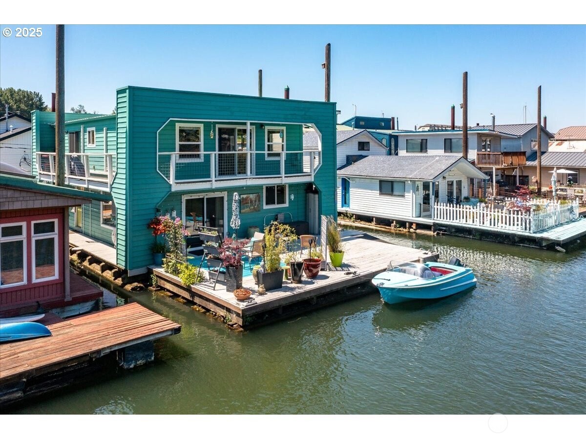 Live the River Life in Style, Unique Floating home on the Columbia River. Experience the ultimate in Pacific Northwest waterfront living with this one-of-a-kind floating home located on the peaceful North Portland Harbor in one of the most coveted moorages in Portland. Offering 1866 squarefeet of thoughtfully designed space, this 2 bedroom, 2 bath retreat blends comfort, style & a true connection to the outdoors. Inside, the main level welcomes you with bamboo floors & a cozy gas fireplace in the living room. A slider opens to a spacious floating dock that doubles your entertaining space. With 180 degree views from upstairs living room you won't want to leave. This floating homes delivers it all within reach of Portland's vibrant city life!