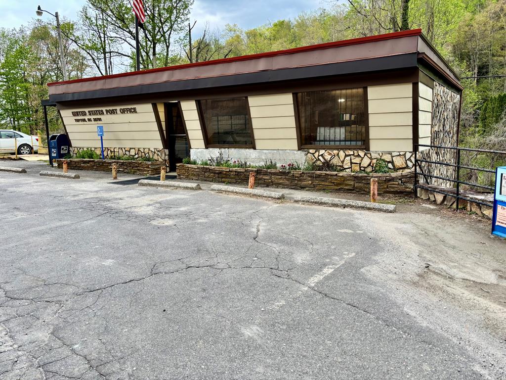 INCOME PRODUCING Commercial Building in an excellent location fronting US Hwy 19/74 with 1.62 acres and over 870 feet of road frontage. Presently being used as Topton Post Office.  Limitless possibilities but ideally suited for retail businesses.  Property was once used as a successful restaurant .  Full unfinished basement not counted in square footage.  Great location near Nantahala River for Whitewater Rafting, Lake Nantahala and Lake Santeetlah. and other scenic sites Smoky Mountain Railway adjoins the property as well.