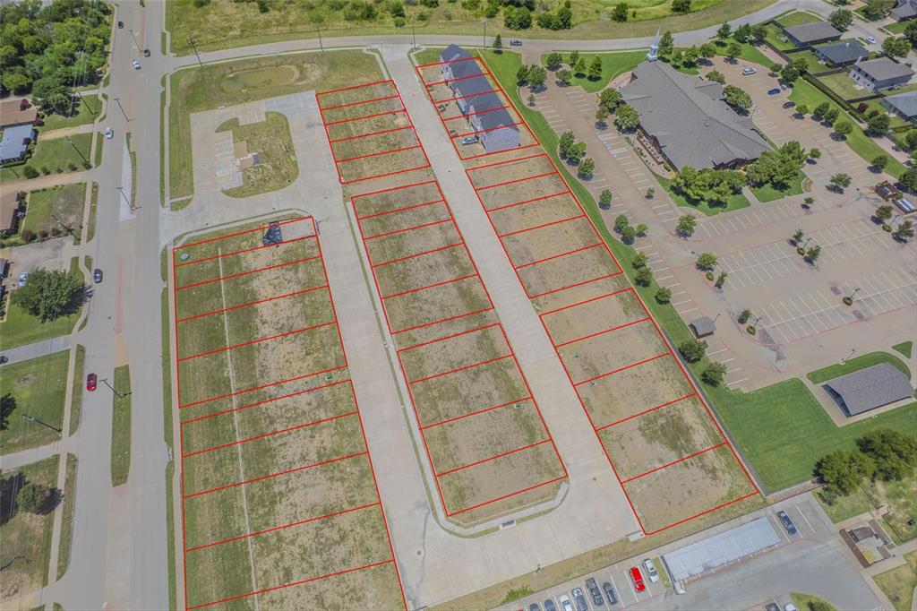 MLS# 21008591 ~ The Apollo is a rare opportunity to acquire 34 finished townhome lots in the heart of Wylie, an area experiencing explosive growth and limited new home inventory. Located in the highly rated Wylie ISD and just steps from Collin College, city parks, and new retail, this community is ideally positioned for townhome builders targeting first-time buyers, move-up families, or relocating professionals. Each lot is fully improved with underground utilities, concrete paving, stormwater systems, and city approvals - all designed to eliminate delays and fast-track vertical construction. The townhome lots average 35’ x 85’ and feature fenced-in backyards, adding privacy and value. With no PID or MUD and annual HOA dues of just $2,100 per unit, The Apollo delivers long-term financial advantages to both builder and buyer.