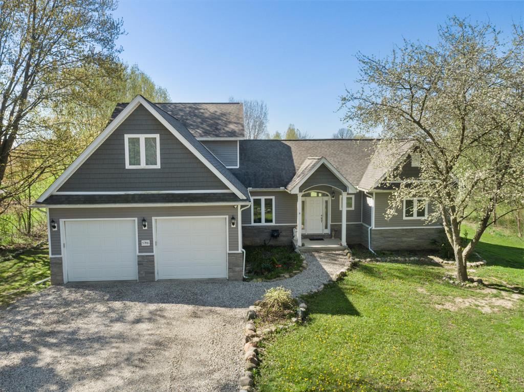 Located in Howell Township within the Howell School District, this 33.26+/- acre Livingston County property delivers a rare combination of modern home construction, strategicaly developed wildlife habitat, and significant frontage along the Red Cedar River. Designed for both comfortable living and serious recreational use, this property stands out as a highly functional and well-equipped rural offering in southern Michigan.The home, built in 2018, offers approximately 2,333+/- square feet of thoughtfully designed living space with three bedrooms, two and a half bathrooms, and a full basement. The interior features a well-appointed kitchen with granite countertops, standard cabinetry, and a spacious island  that provides additional prep space and seating. A walk-in pantry offers ample storage, and stainless appliances from Frigidaire, Whirlpool, and LG are included. The main living area includes a propane fireplace, creating a warm and functional gathering space.The primary suite includes a walk-in tile shower, soaking tub, and double vanity, while the guest bathroom features a fiberglass tub and shower combination. Flooring throughout the home includes vinyl plank, tile, and carpet on the main level, with carpet and tile upstairs and a concrete basement. Additional interior features include a dedicated office, walk-in closets, and a mudroom with first-floor laundry. The mudroom also includes a dog wash station and built-in storage, adding practical functionality for everyday use. Ceiling heights are 9 feet on the main level, 8 feet upstairs, and 8 feet in the basement.Mechanical systems include a 2019 Trane furnace and central air system, along with a Rheem Marathon water heater with a lifetime tank warranty. The home is equipped with both a water softener and filtration system. Construction details include spray foam insulation, a combination of 2x4 and 2x6 wall construction, and casement windows. Utilities include propane and electric service, along with Verizon internet providing approximately 90 Mbps downloa