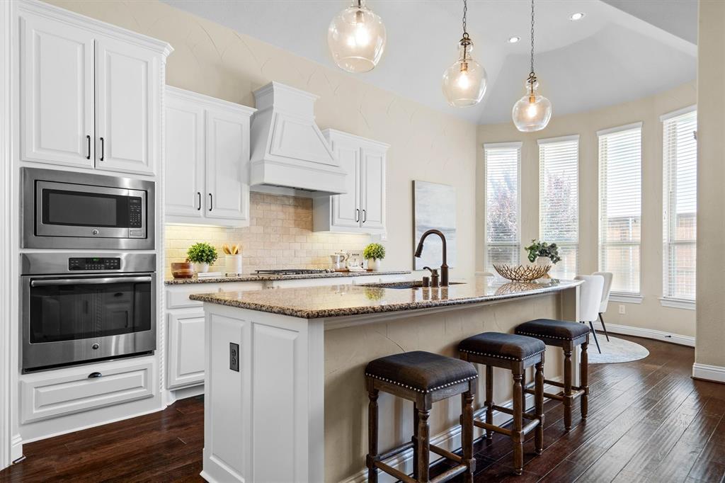 Welcome Home to Trophy Club – Where Texas Charm Meets Modern Family Living! Nestled in the heart of this picturesque town, this beautifully updated one-owner home offers nearly 2,800 square feet of comfortable, elegant living. With 4 bedrooms and 3.5 baths, it's just steps from scenic hike-and-bike trails and surrounded by year-round amenities including lush parks, tennis and pickleball courts, swimming pools, and a nearby dog park your furry family members will love. Inside, the open-concept layout is perfect for entertaining, featuring a light and bright kitchen with island seating, gas appliances, and a seamless flow ideal for hosting and everyday living. Hardwood flooring flows throughout the main level, adding warmth and sophistication to every space. Step outside to your private backyard retreat, complete with an extended travertine patio—ideal for gatherings or quiet evenings under the stars. Upstairs, you’ll find three generously sized bedrooms, a Jack-and-Jill bath, and a convenient half bath, providing comfort and privacy for everyone. Ample storage throughout the home ensures everything has its place. As a bonus, an unfinished 200–300 sq ft space above the epoxy-finished two-car garage offers endless potential—perfect for a future home office, studio, or guest suite, limited only by your imagination. Relax with breathtaking sunsets from your front porch—this is more than a home, it’s a lifestyle. Your dream home in Trophy Club awaits!