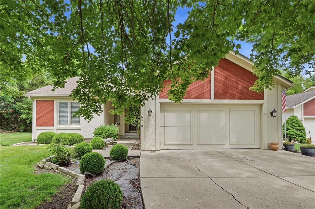 Tucked away in the quiet Raintree neighborhood, this charming ranch-style villa offers easy living with the perfect blend of comfort, space, and low-maintenance convenience. With 2 bedrooms, 2 full bathrooms, and over 1,600 square feet, this home features an inviting layout. Step inside to a spacious great room with a cozy floor-to-ceiling brick fireplace, abundant natural light, and seamless flow into the dining and kitchen areas. The main-level living design offers everyday convenience, while the large unfinished basement provide the opportunity for additional flexible space for a second living area, home office, hobby room or storage. The generously sized master suite offers a private retreat with its own full bathroom and ample closet space, while the second bedroom and bath make hosting guests or accommodating family easy. Additional highlights include an attached 2-car garage, maintenance-provided lifestyle, and a desirable location close to shopping, dining, parks, and quick highway access. Whether you’re looking to simplify, downsize, or enjoy carefree living in a prime Johnson County location, this home is full of opportunity and comfort.